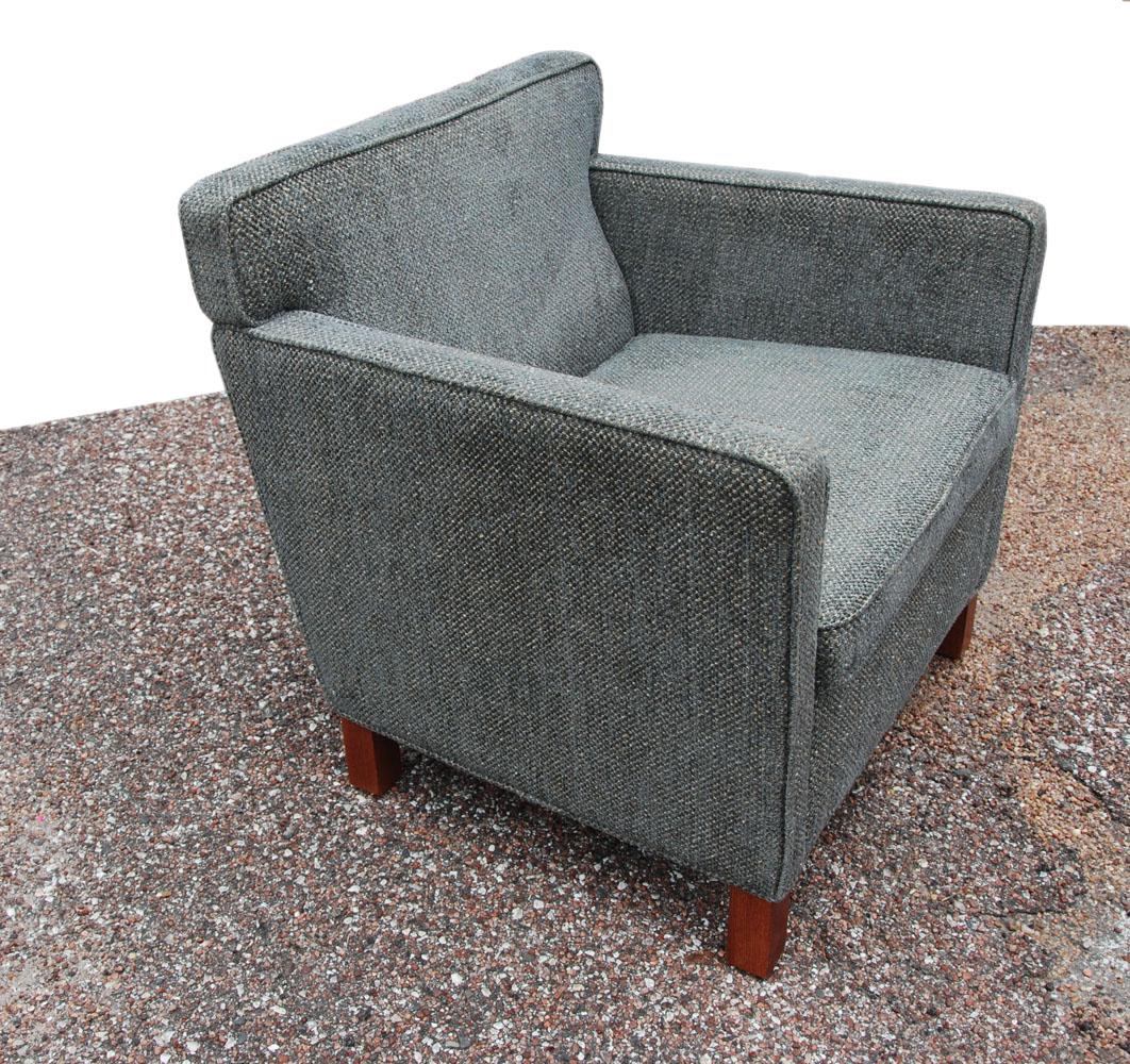 By Ludwig Mies van der Rohe 
1927

Krefeld collection lounge chairs
Classic composition meets simplicity in these lounge chairs designed in 1927.
Clean lines and exceptional comfort. Upholstered in a rich, warm grey tweed fabric highlighted
