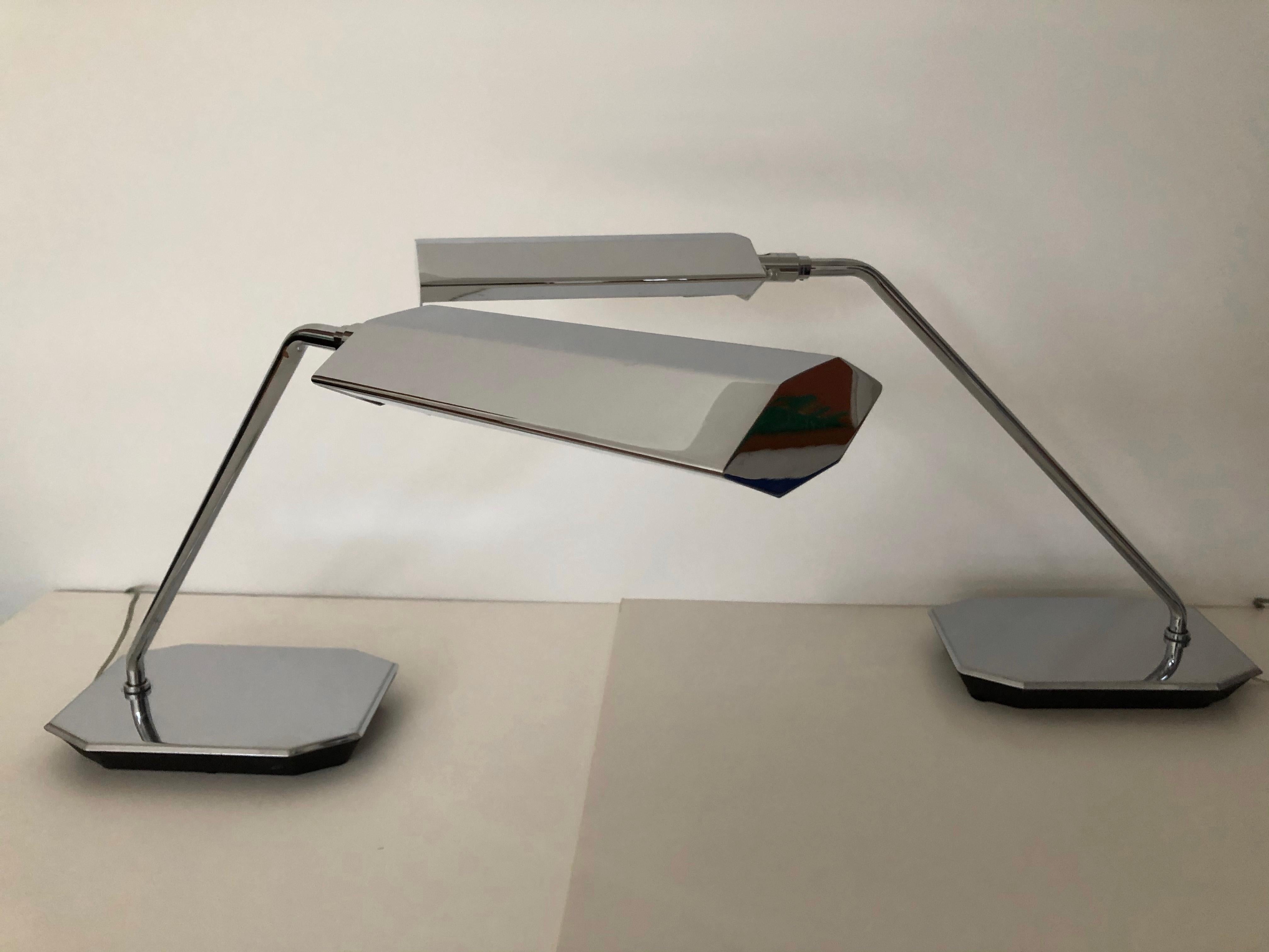 Mirror chrome Koch & Lowy swing arm adjustable desk / table lamps, vans adjust head to back light and area and appear more sculptural.
when you adjust shade up towards wall for back light, the measurement is 23.50 to top.