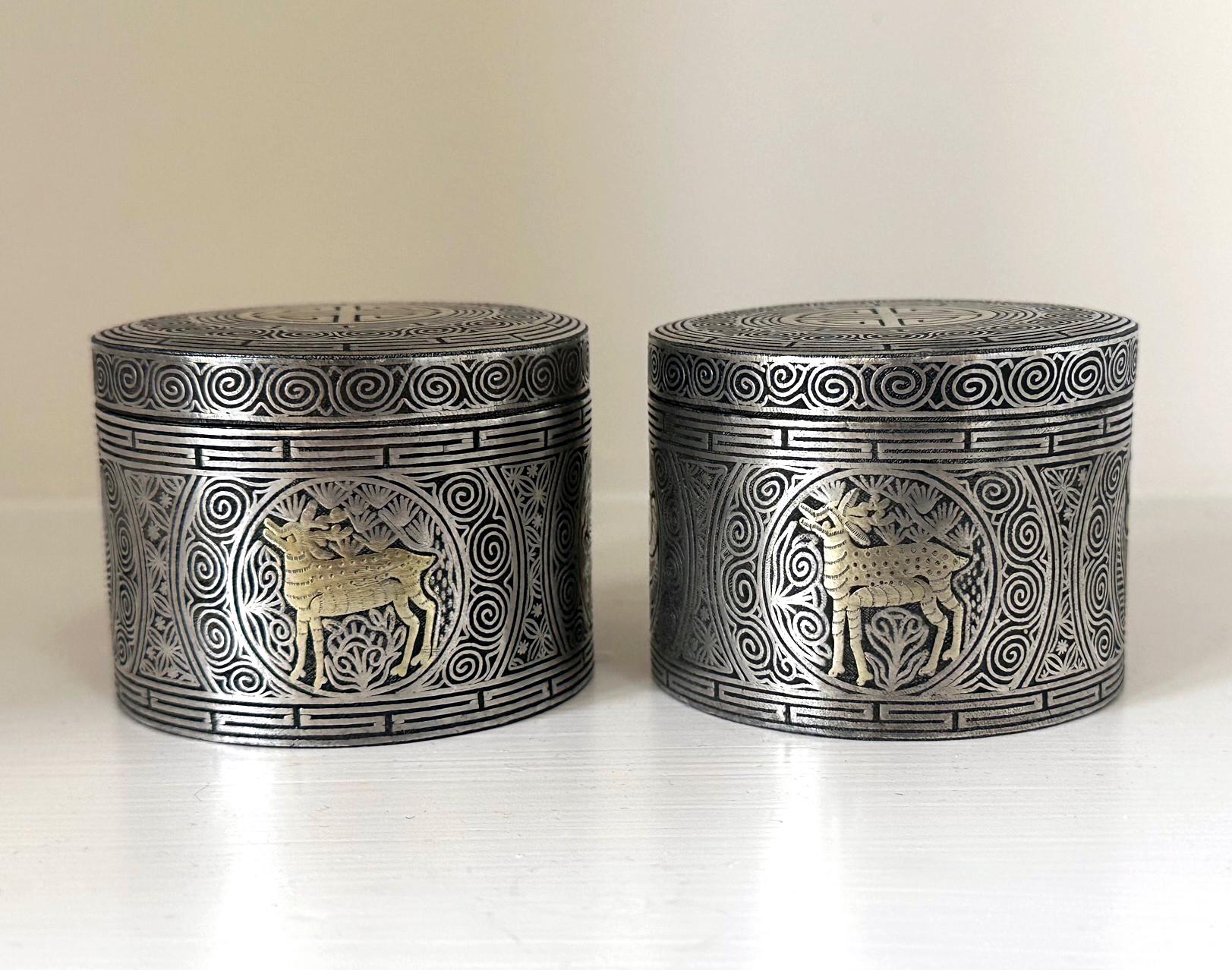 A fine pair of Korean iron box with intricate silver inlays dated to the late Joseon Dynasty circa 19th century. The matching circular boxes was most likely used to store tobacco leaves or other small household items. Their surface was beautifully