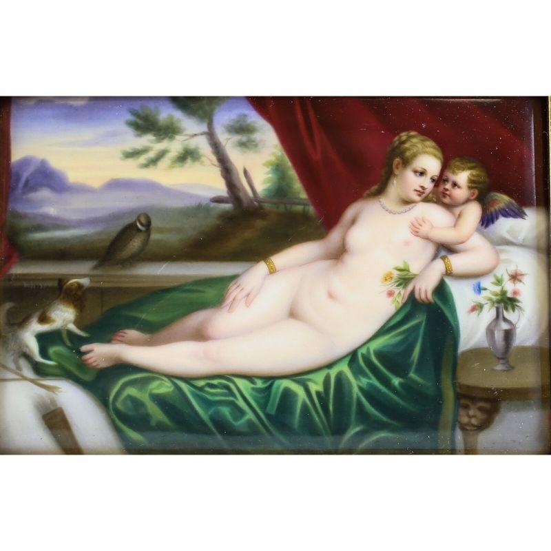 Pair of KPM Porcelain Portraits in Gilt Wood & Tapestry frames, c1900. 

Beautiful Hand Painted Romantic scenes of Nude women lounging in bed w/ winged cherub & child w/ nanny respectively. Marked for KPM on reverse of both