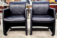 Pair Kron Furniture Black Leather Guest Rolling Armchairs