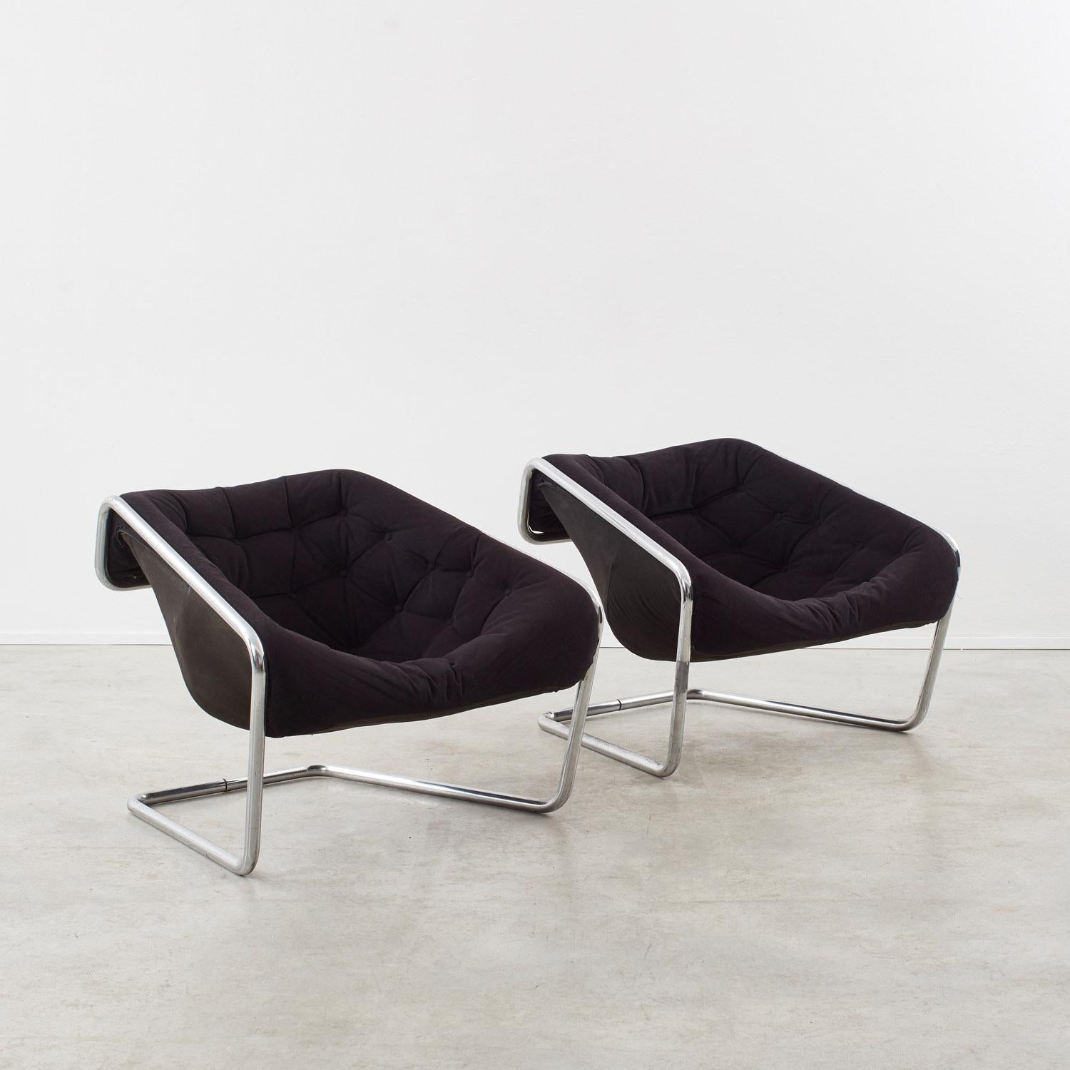 A pair of Boxer chairs by Kwok Hoï Chan, manufactured by Steiner in the 1970s. Chan emigrated to the UK and later to France, but never lost sight of his heritage. His dynamic forms are said to resemble a fictional alphabet borrowed from Chinese