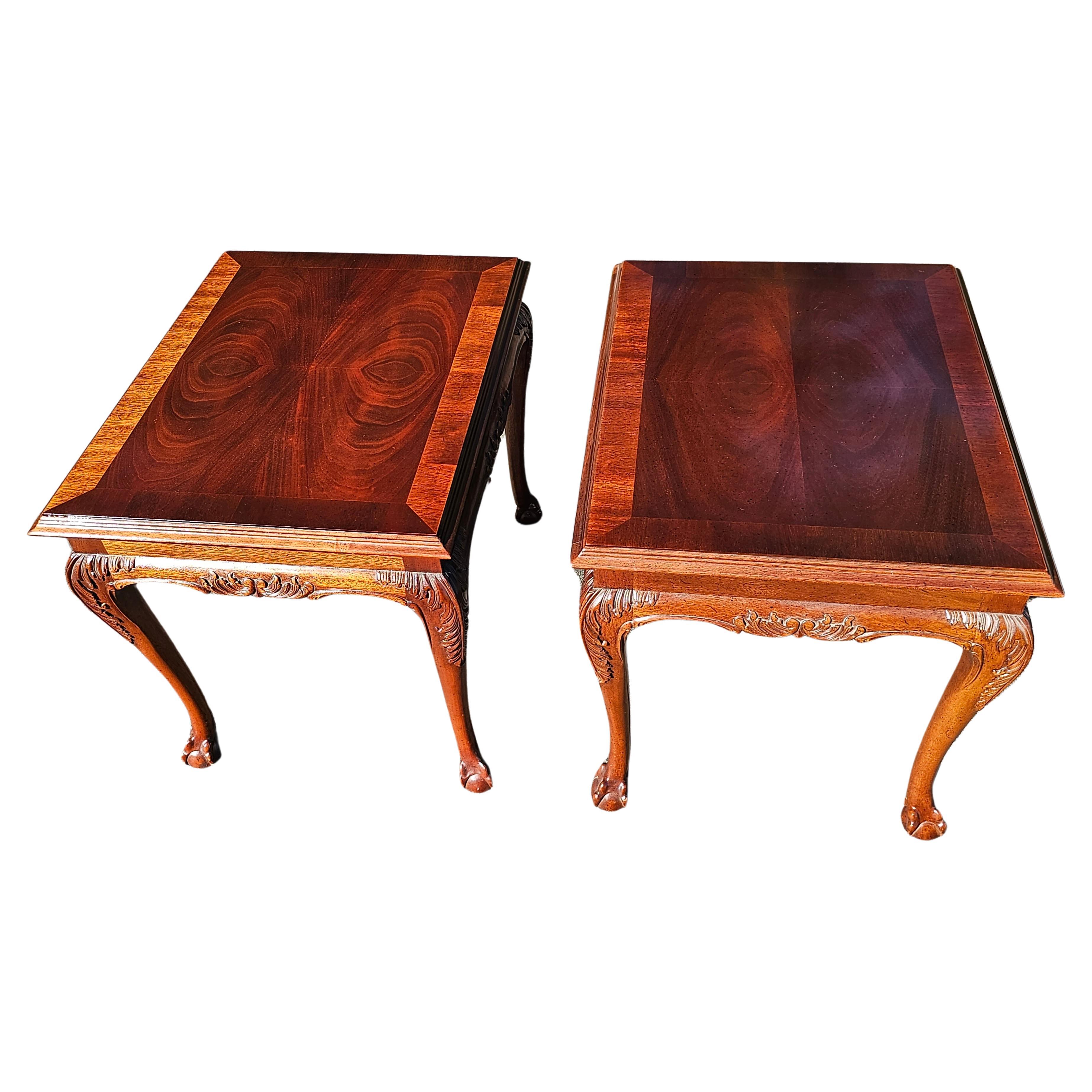 A well kept Pair of Lane Altavista Virginia Chippendale Carved Mahogany with Ball Claw Feet. Feature beautifully carved cabriole legs with acanthus leaves terminating with ball and claw feet. Banded top with swirl mahogany. 
Measure 22