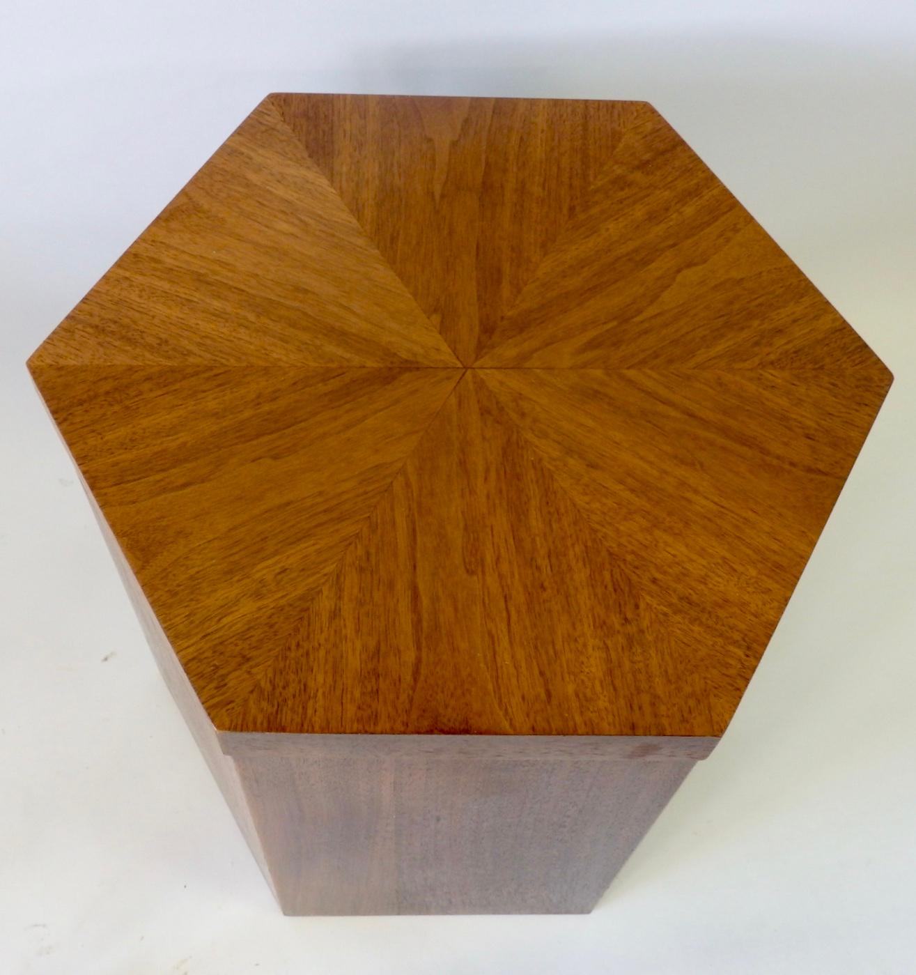 Pair of nicely grained walnut pedestals or side tables in hexagon form.