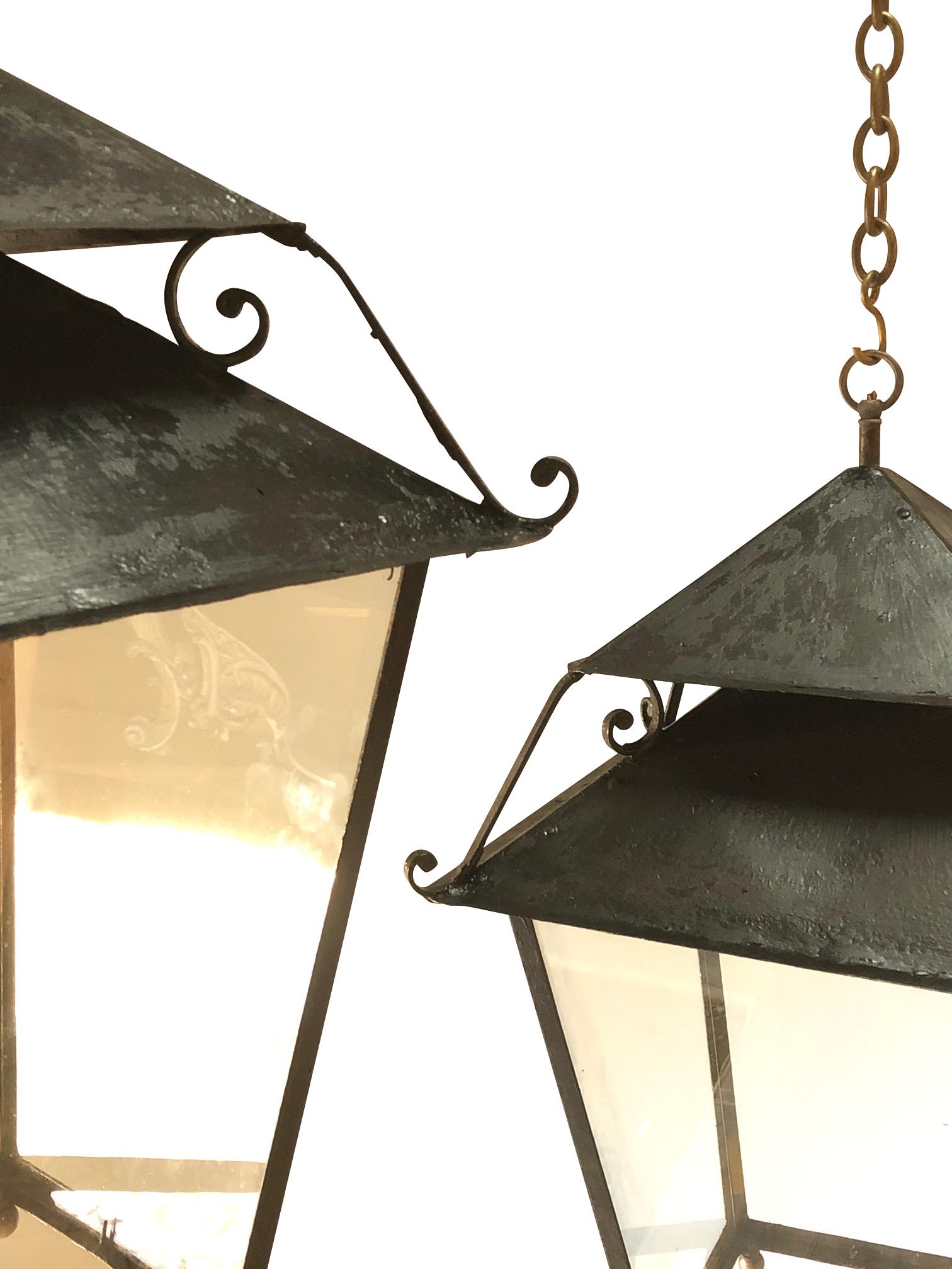 19th Century French pair unusual design lanterns
Made of iron and toleware
Clear glass.
Beautiful natural aged patina.
Bottom dimensions are 8.5