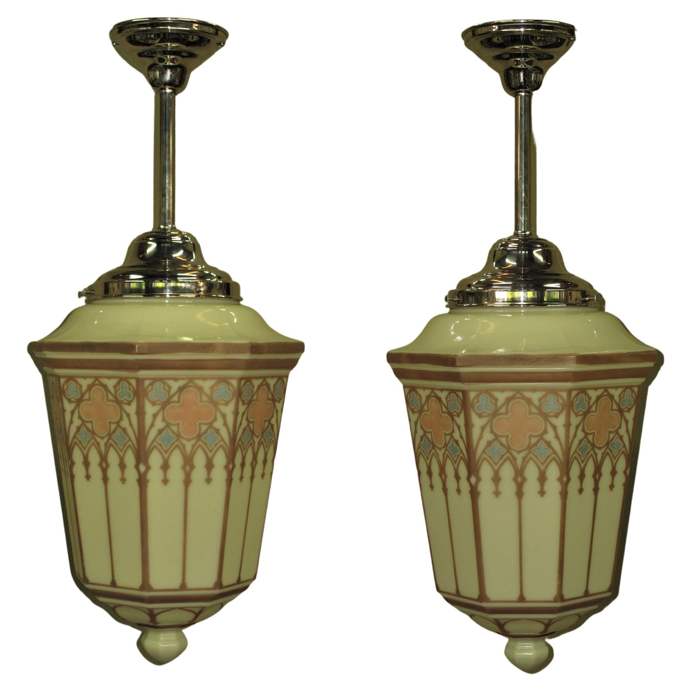 Single only available.  Price is for one ceiling fixture.
Large, colorful, and very attractive 1930's (possibly 20's) Art Deco designed church fixtures with new painted fitters. The custard glass globes have patterns in tan, light blue, and a light