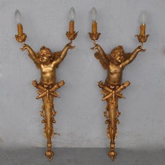 Coppia di grandi lampade a 2 luci 1900 Art Nouveau Bronzo dorato con bambino