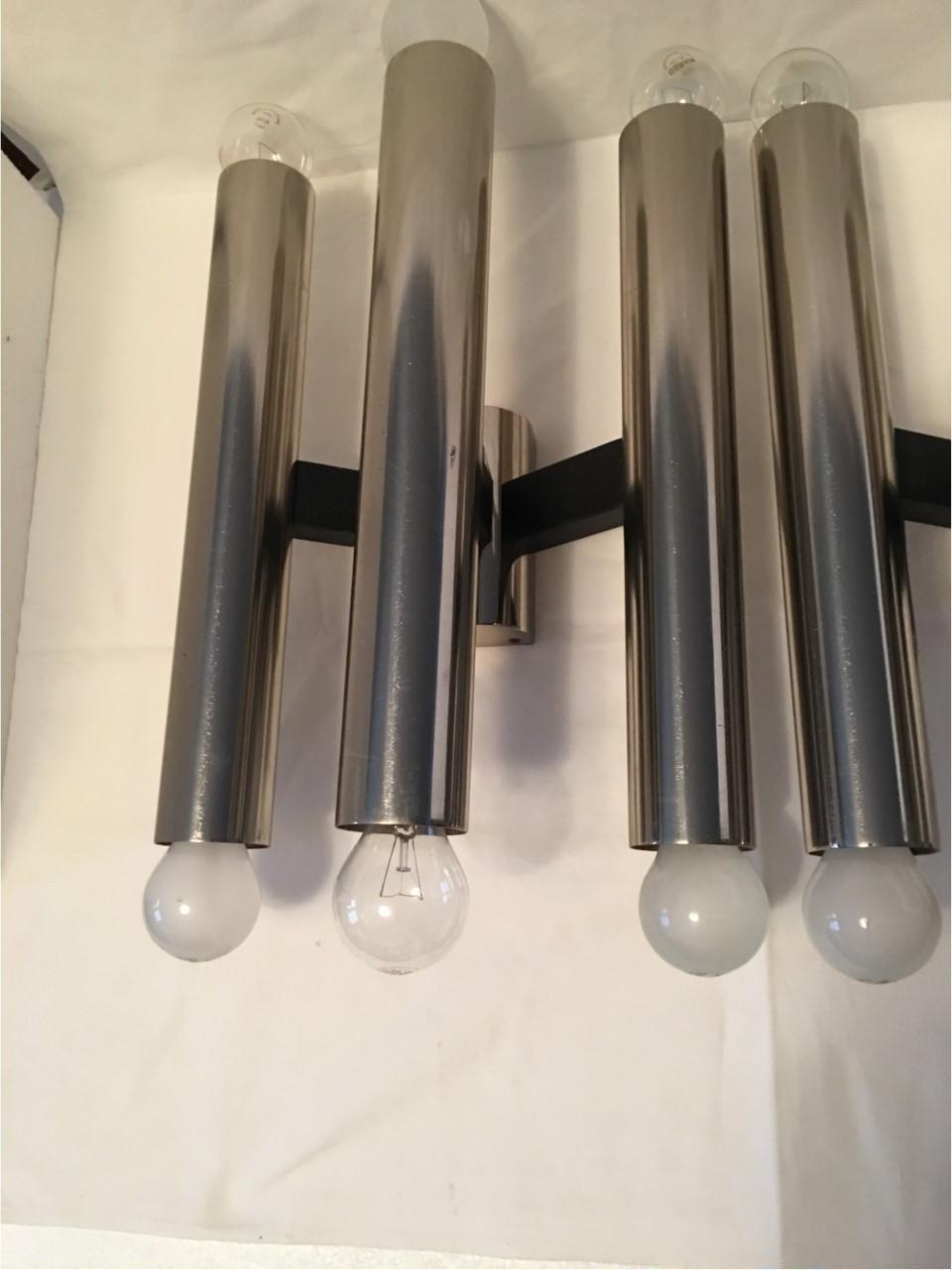 A pair of midcentury large 6-light sconces VEB Narva from midcentury Germany. With chrome fasteners and tubes. Manufactured in Leipzig by VEB Narva Leuchtenbau, East Germany in the 1960s. Each fixture requires six European E 26 / E27 Edison bulbs,