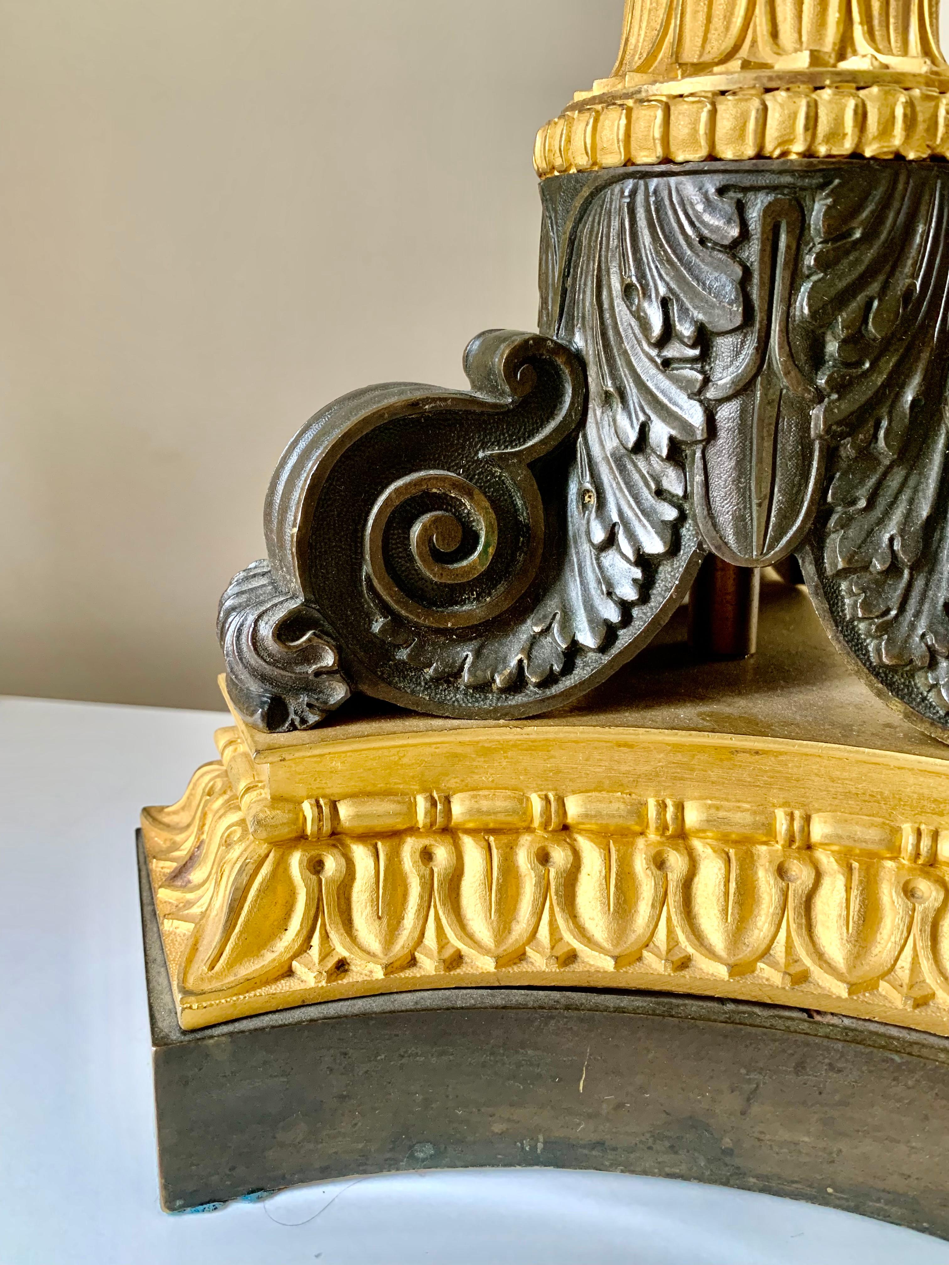 Substantial, fabulous quality Charles X period gilt and patinated bronze column lamps.
Original matte and burnished gilding in outstanding condition
Unusual lotus shaped gilded capitals above a circular tapering patinated bronze column with an