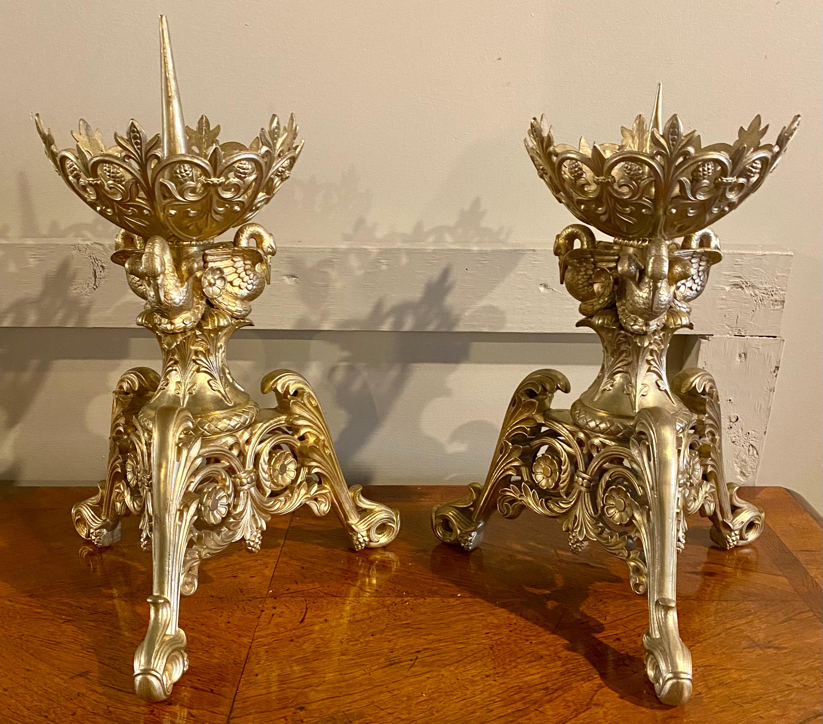 Pair exceptional antique early 19th century French gold bronze chateau candle holders with swans. Wonderful Gothic candlesticks in a large size and with intricate carving.
 