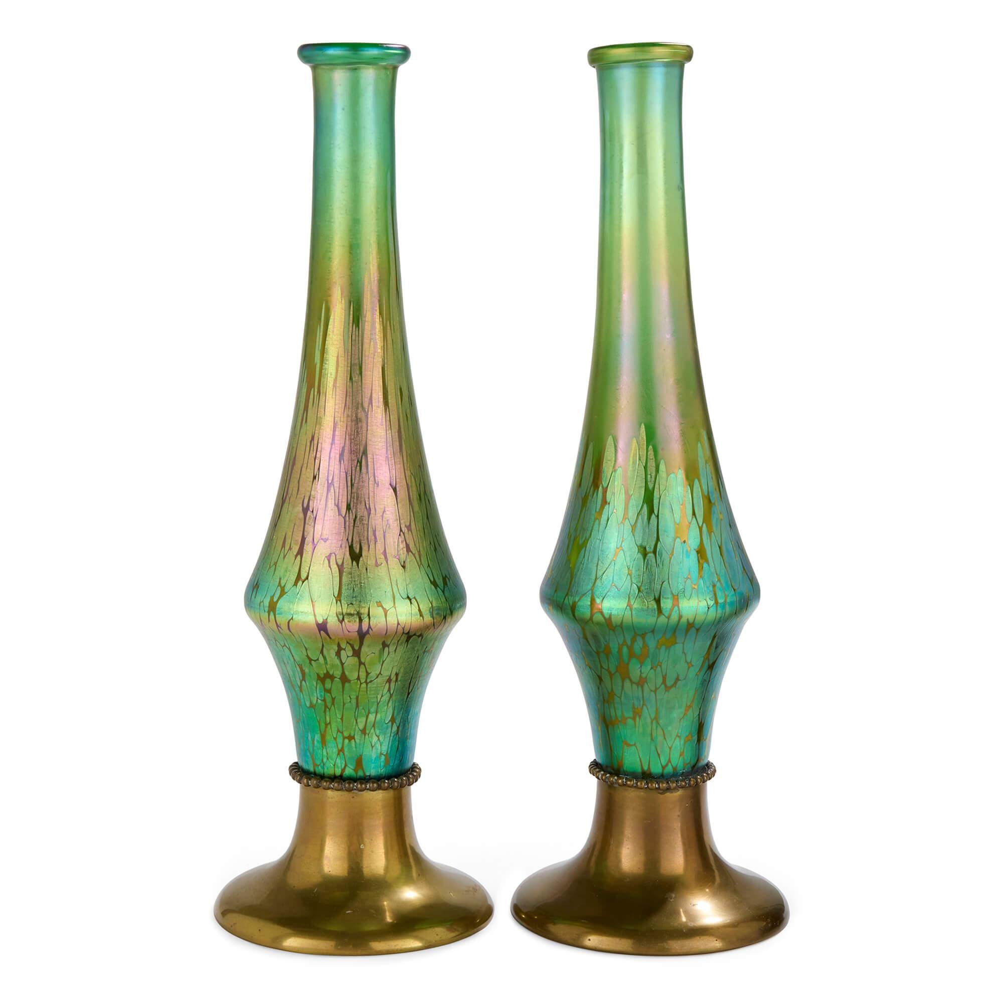 Pair Large Austrian Green Gold Art Nouveau Jugendstil Glass Gilt Metal Vases 
Austrian, c. 1910
Height 49cm, diameter 16cm

Reflecting the innovative spirit of late 19th century Austrian craftsmanship, this elegant pair of vases is fashioned from