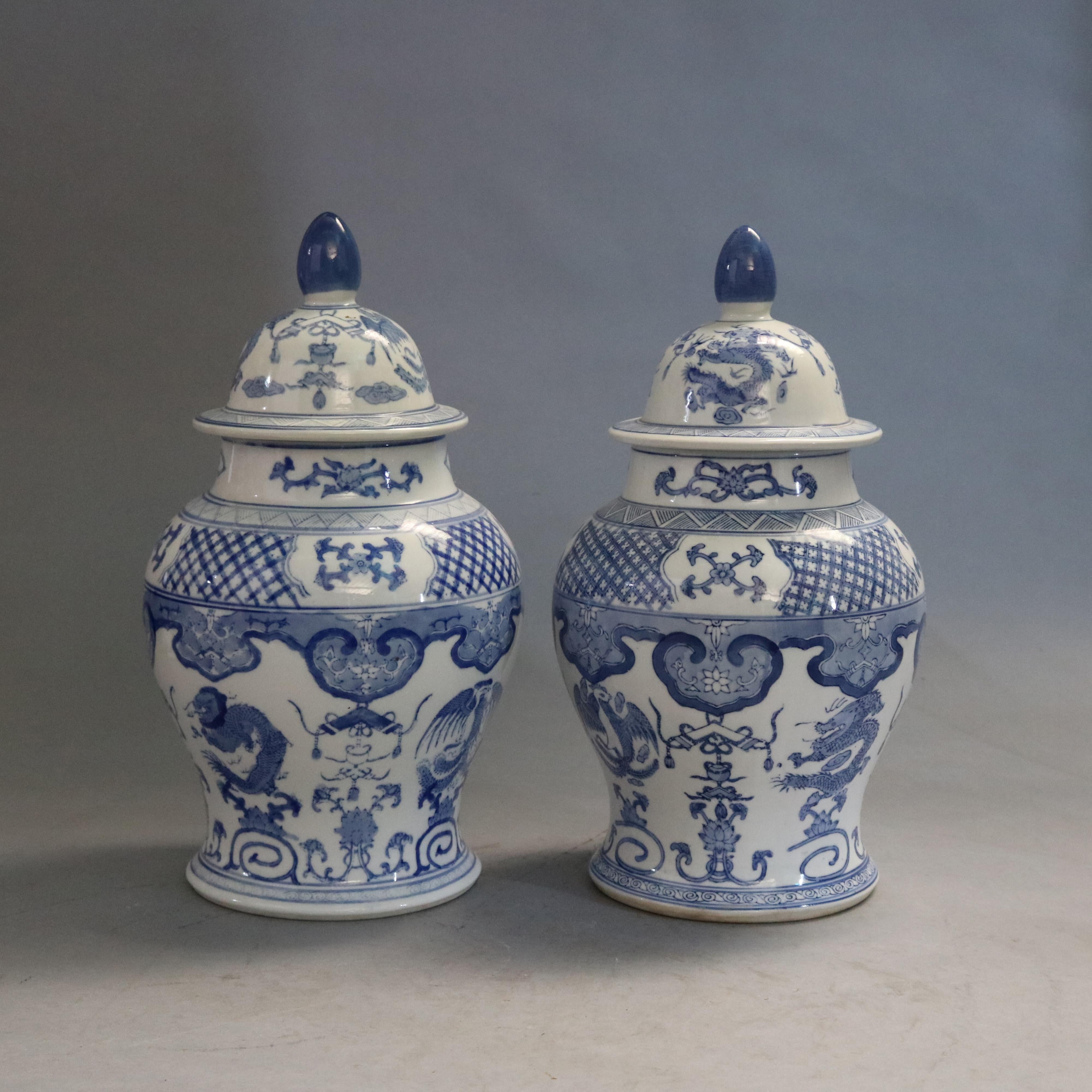 large blue and white urns