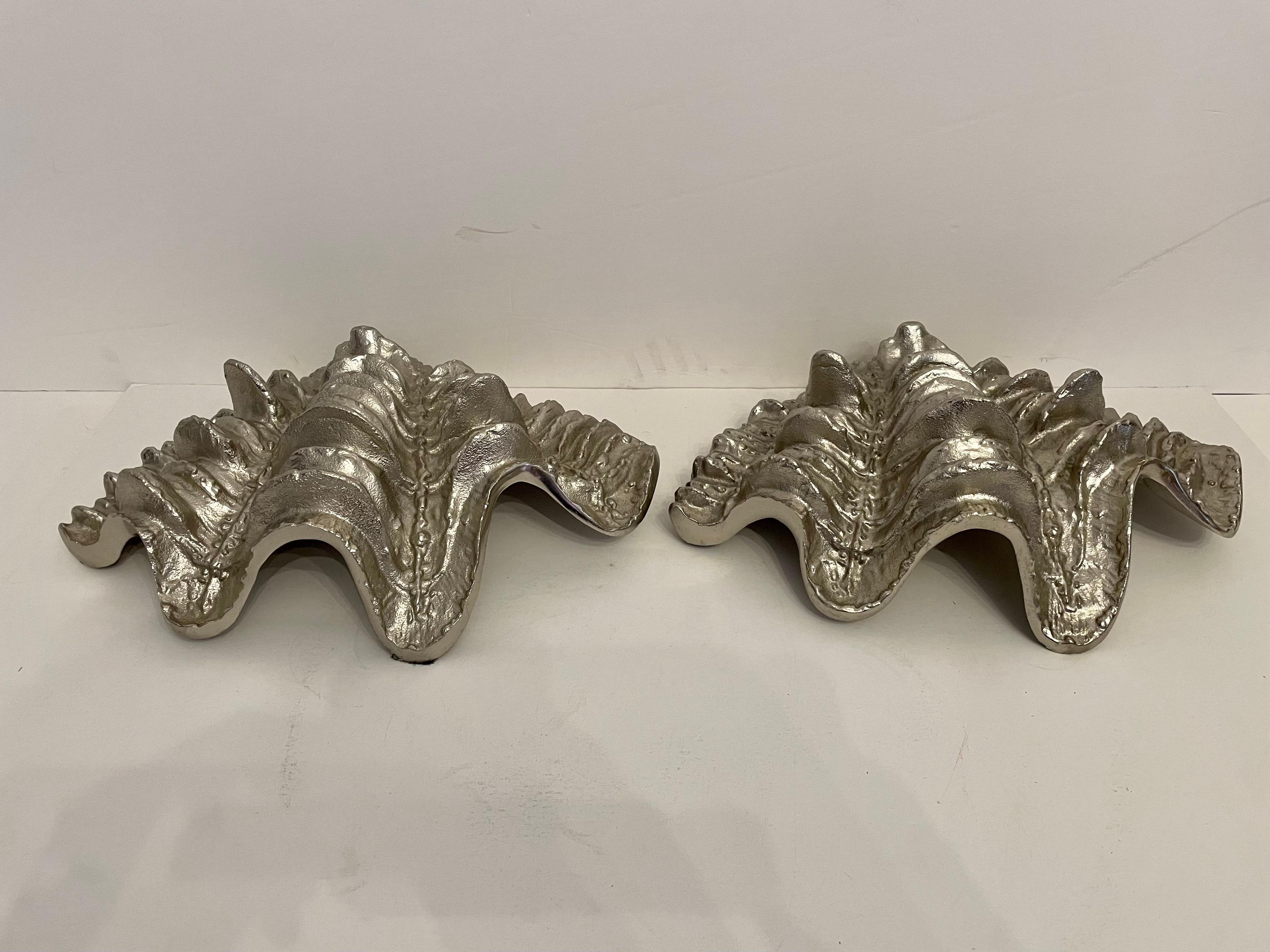  Pair Large Clam Shells or Seashells. Vintage Hollywood Regency style, nicely detailed casting in polished aluminum. Good overall condition with slight patina from age and use. Measures 13