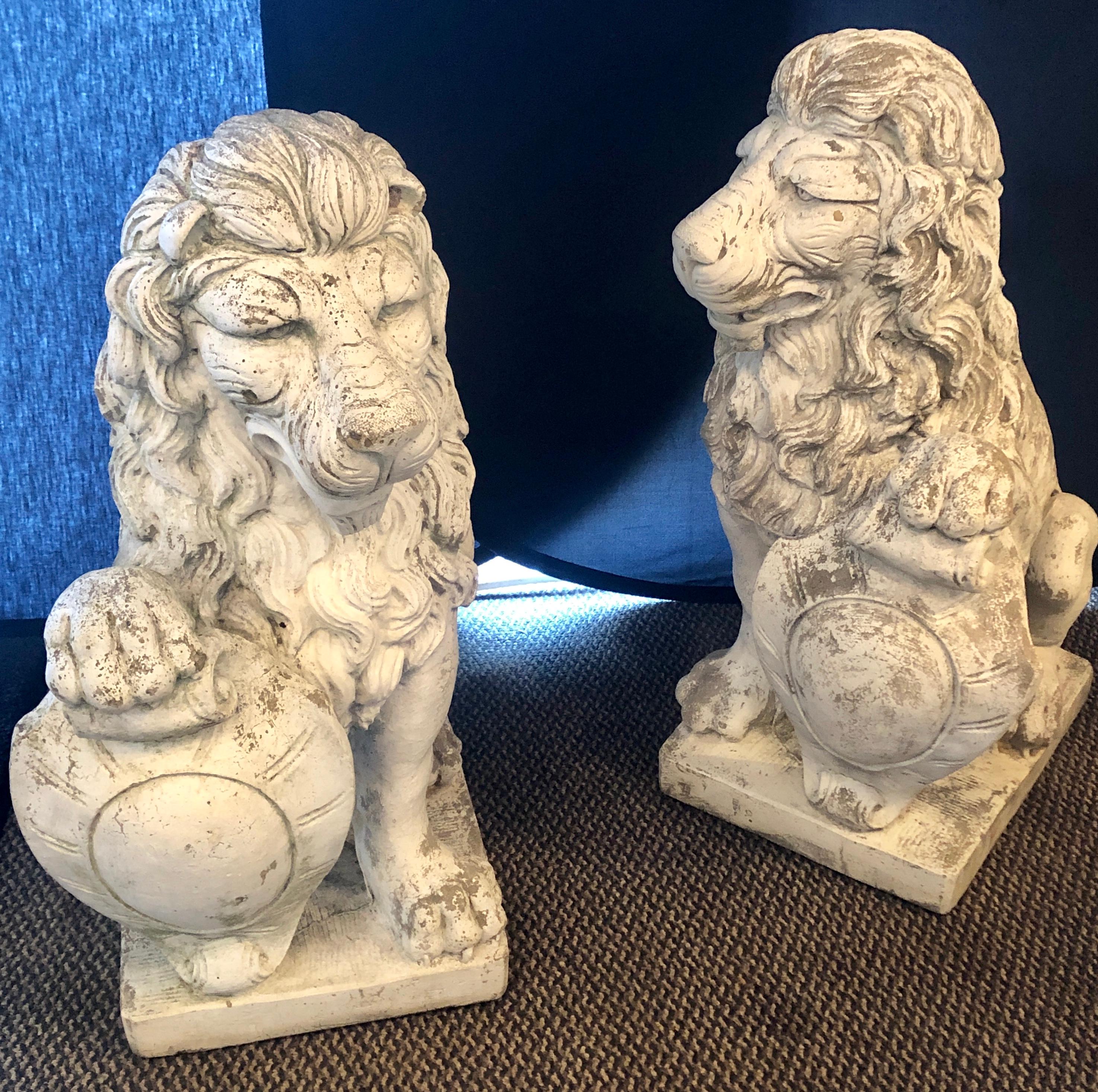Large Cast Stone Shielded Entrance Lions Opposing Direction Signed, Pair In Fair Condition In Stamford, CT