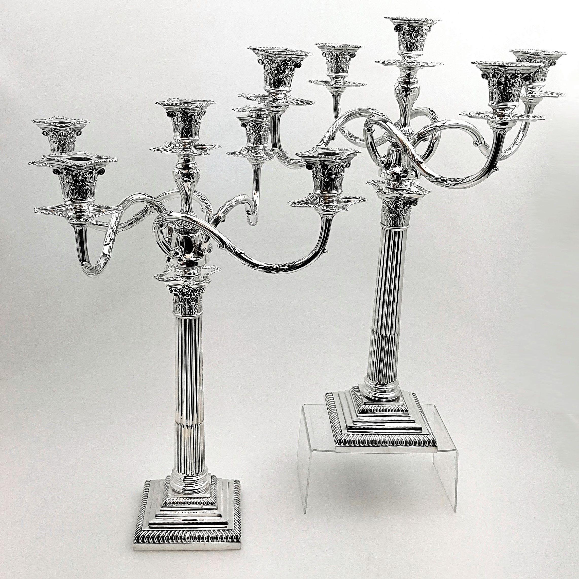 A huge pair of sterling Silver 5-light Candelabra in a classic Corinthian column design. The magnificent branches are removable, and the Candelabra transform to become single light Candlesticks. 
 
 Made in London in 1924 for American Company Black,