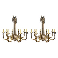Pareja de grandes candelabros de 8 brazos de metal dorado