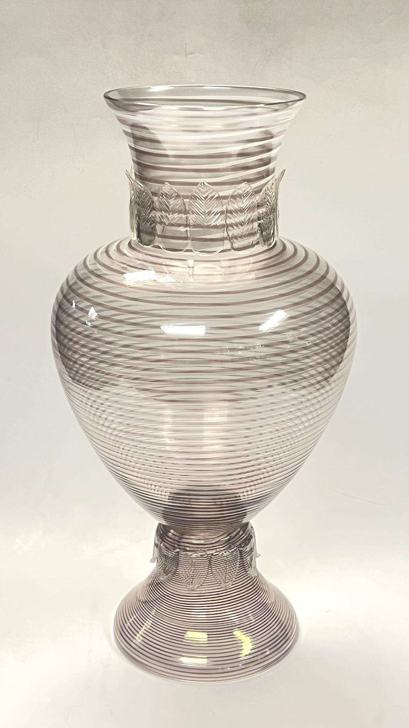 Pair of Italian filigrana glass vases are distinguished by their very large size, 23 1/4 inches tall and 12 inches across.  Apparently unsigned, possibly from Cenedese of Murano, Italy.