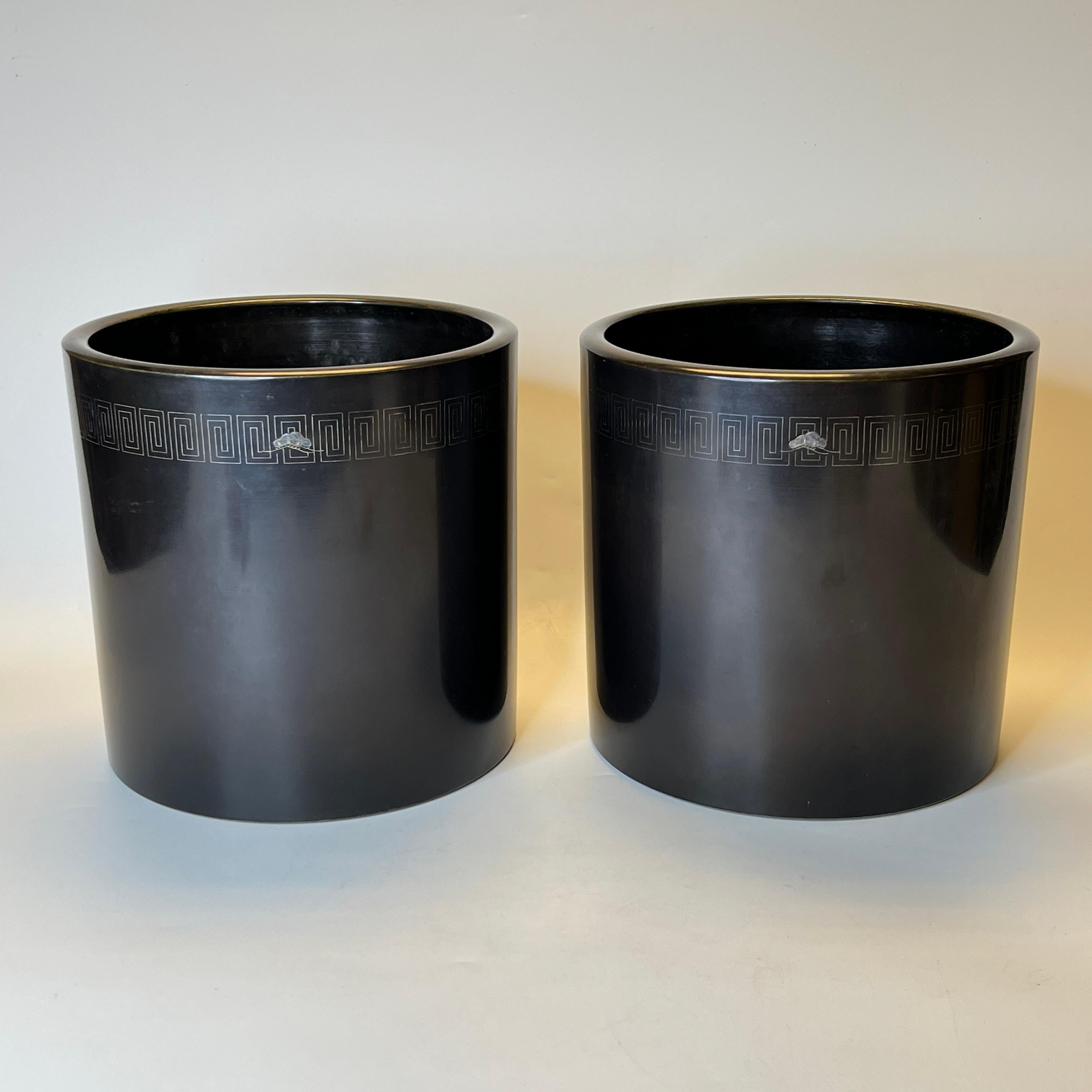 Our large pair of Japanese mixed-metal brush pots have beautiful inlaid silver designs of flowers and clouds and repeating geometric motif. Apparently unsigned.