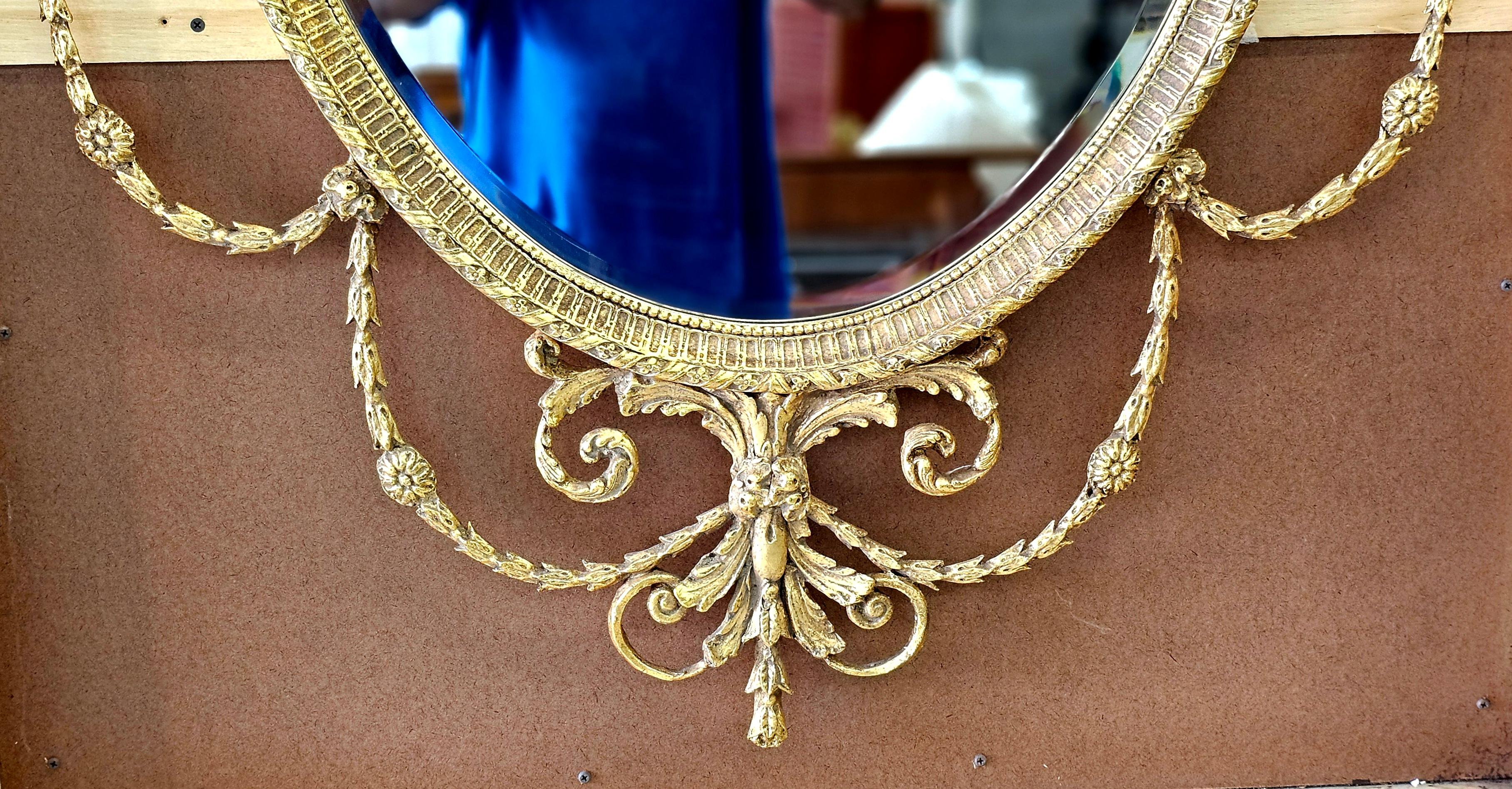 Pair Large Oval Robert Adam Style Gilt Wood Foliate Wall Mirrors In Good Condition For Sale In Germantown, MD