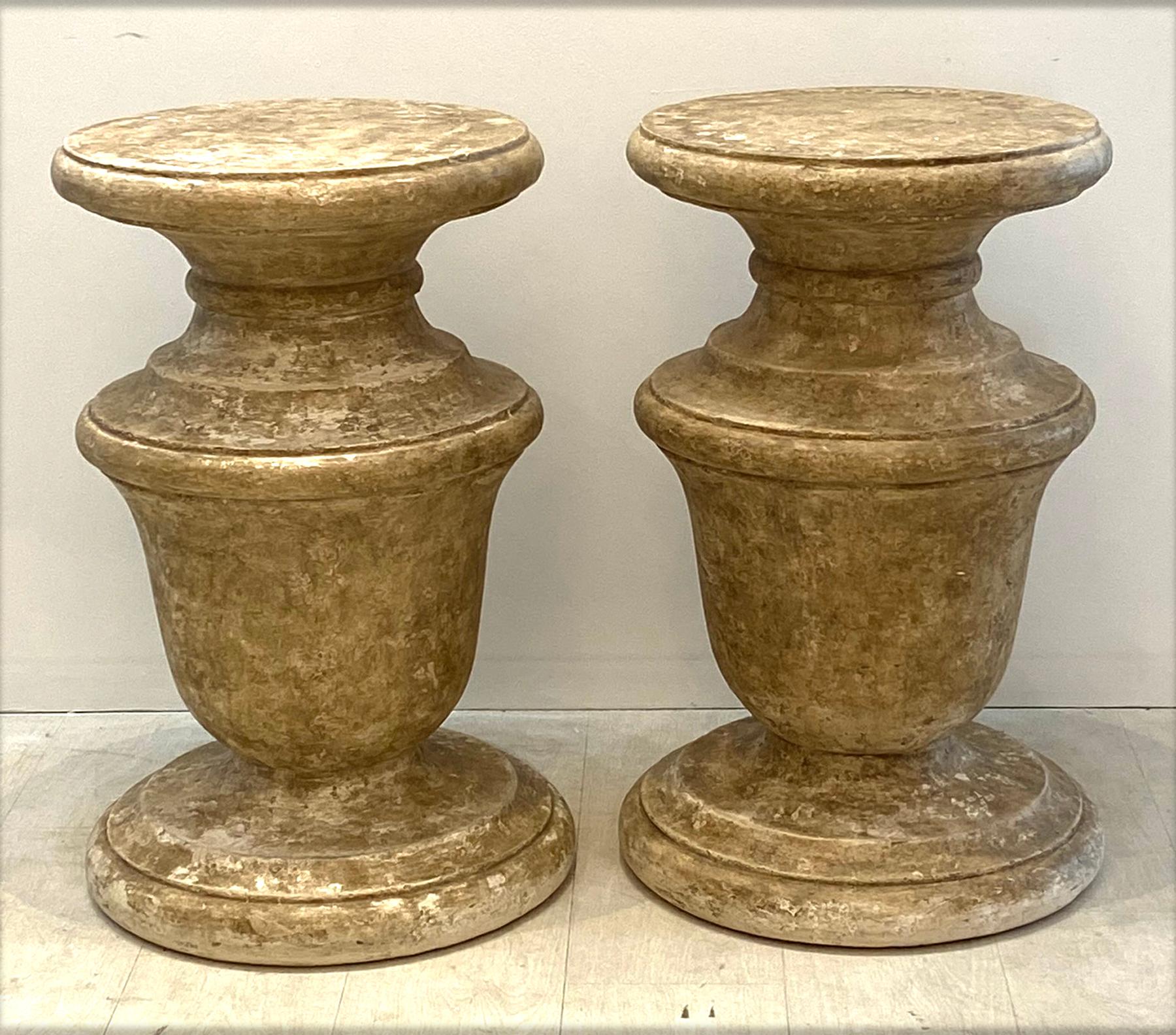 Vintage pair of large decorative plaster round column pedestals with a sponged faux finish.