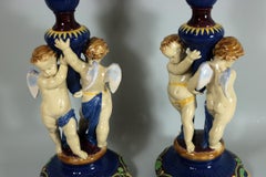 Pair of Large Victorian Minton Majolica Cherub Trumpet Vases