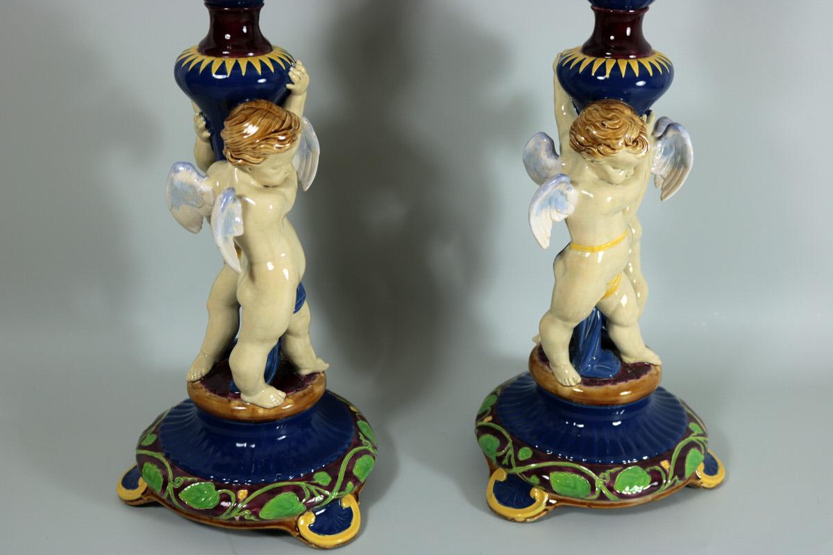 Pair of Large Victorian Minton Majolica Cherub Trumpet Vases In Good Condition In Chelmsford, Essex