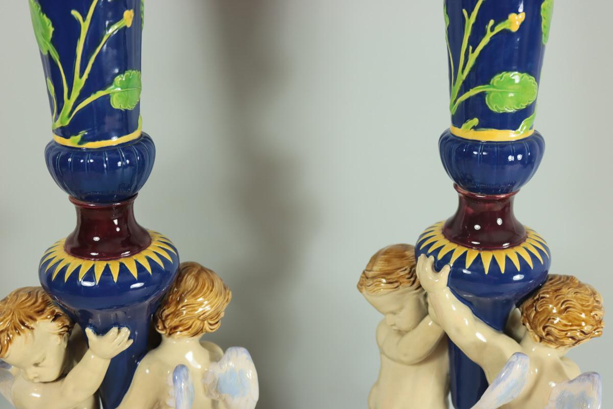 Pair of Large Victorian Minton Majolica Cherub Trumpet Vases 1