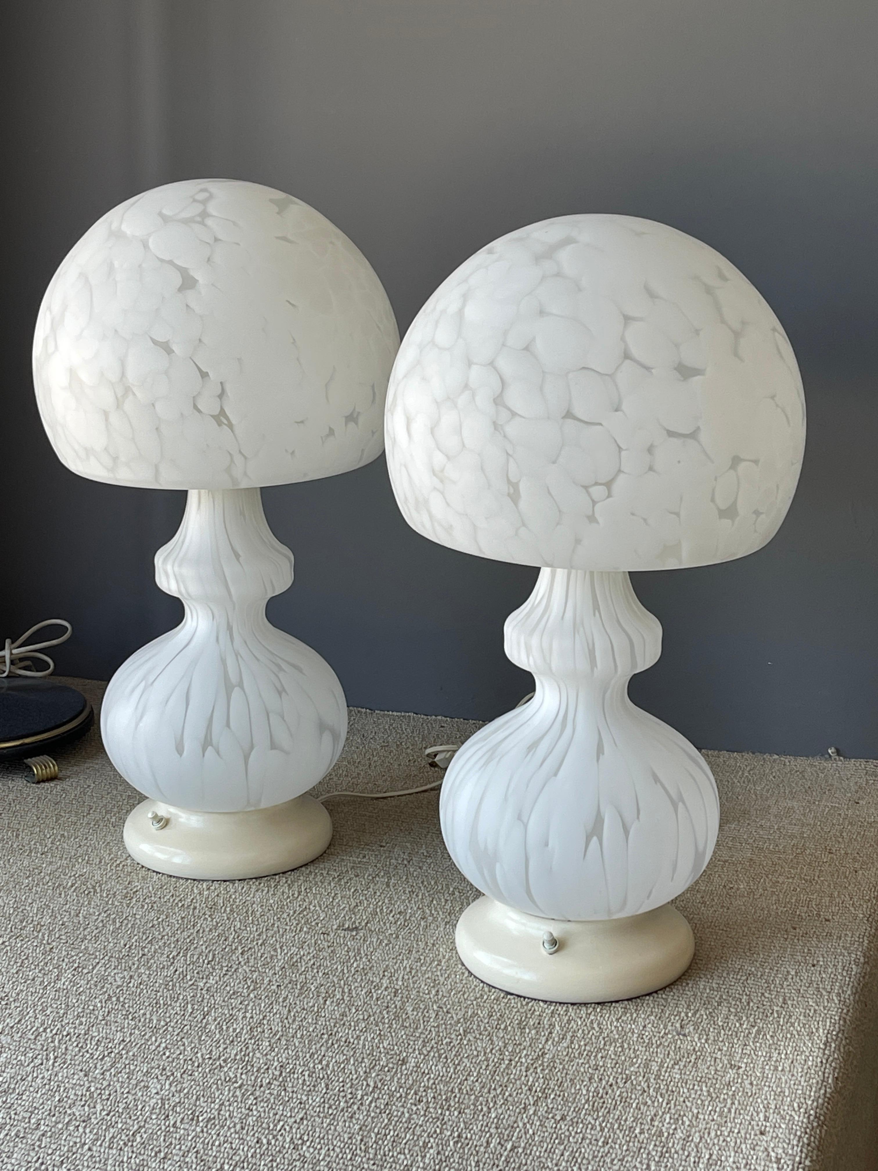 Pair large white spotted, frosted Murano glass table lamps. Has metal base, body and shade are made of glass

Mid-Century Modern, vintage.