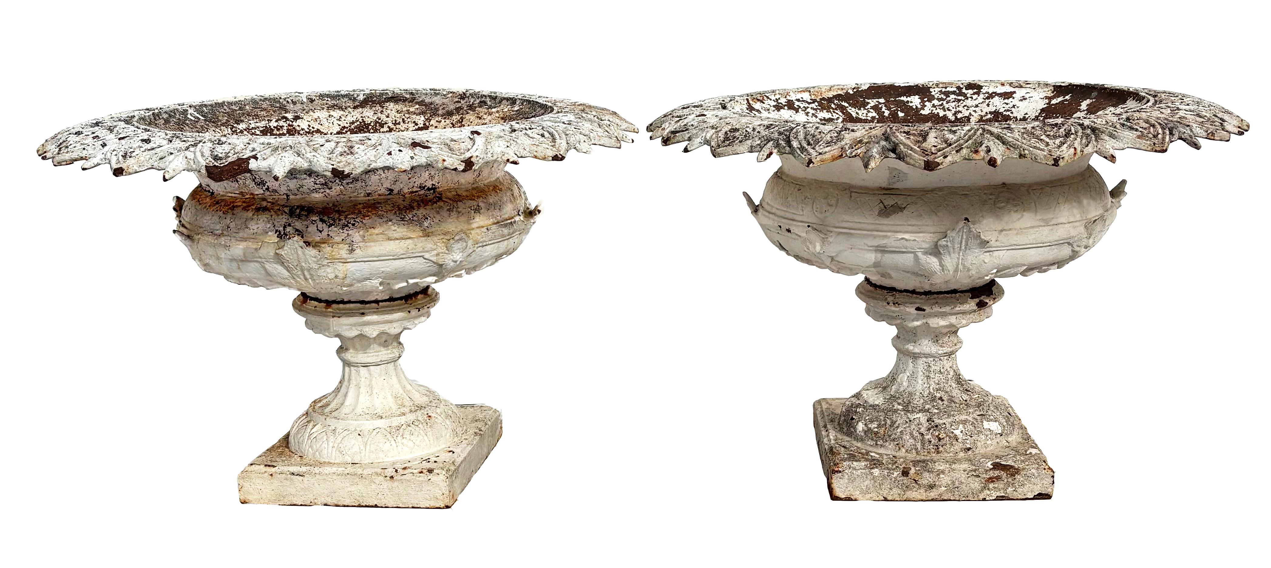 A rare pair of J W Fiske cast iron urns in the largest size the foundry made, 36” diameter and 25” high.  The pattern appears in a c.1870 catalog as “Linden.” The urns are in excellent as-found condition, with a prefect “gardenista” surface. If
