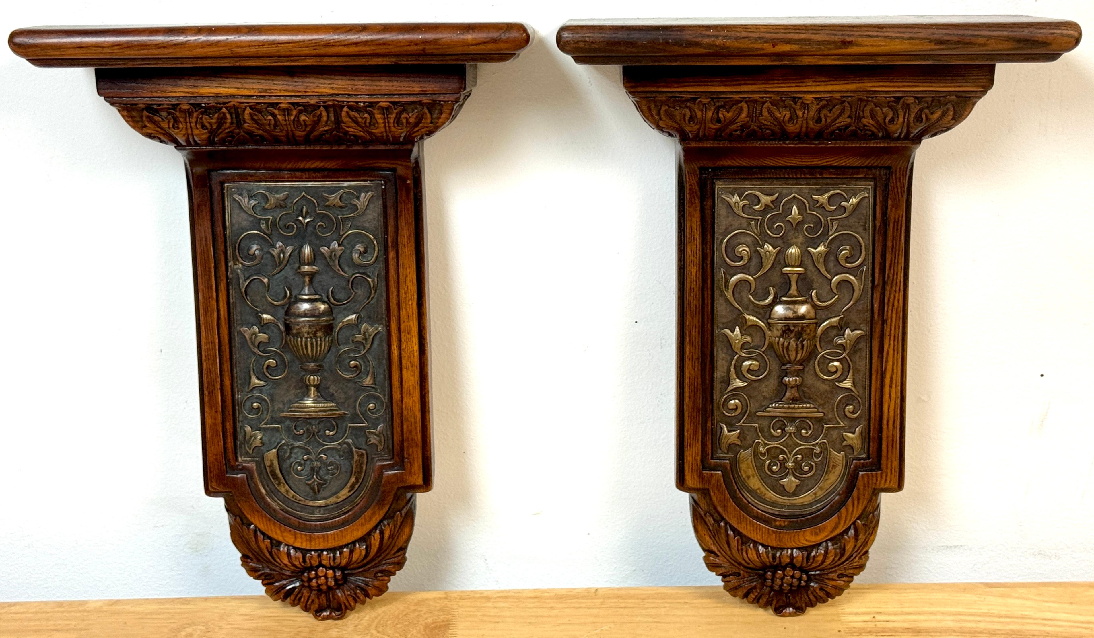 Pair of Late 19th Century English Neoclassical Oak and Silvered Metal Wall Shelves / Brackets

A refined pair of late 19th-century English neoclassical wall brackets, exquisitely crafted from solid oak with applied silvered metal plaques in low