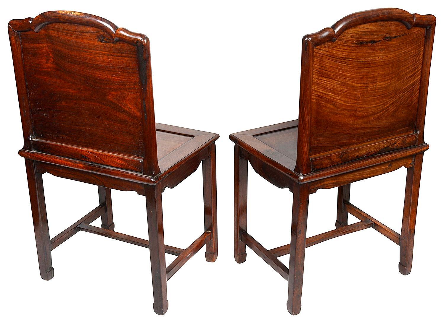 Hand-Carved Pair late 19th Century Chinese hardwood side chairs For Sale