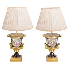 Antique Pair late 19th Century French Sevres style porcelain urn lamps.