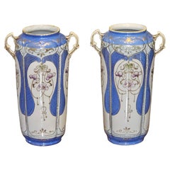 Coppia di vasi Meiji Nippon in porcellana dipinta a mano della fine del XIX secolo