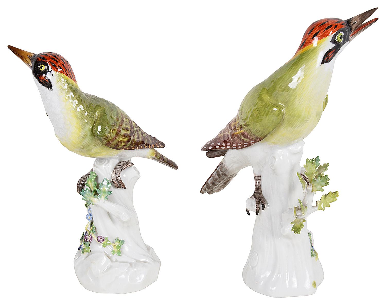 A very good quality pair of late 19th Century Meissen porcelain wood-peckers. Each with wonderful bold hand painted colouring, perched on tree trunks, one with a small caterpillar on it. 
Blue crossed swords to the bases.