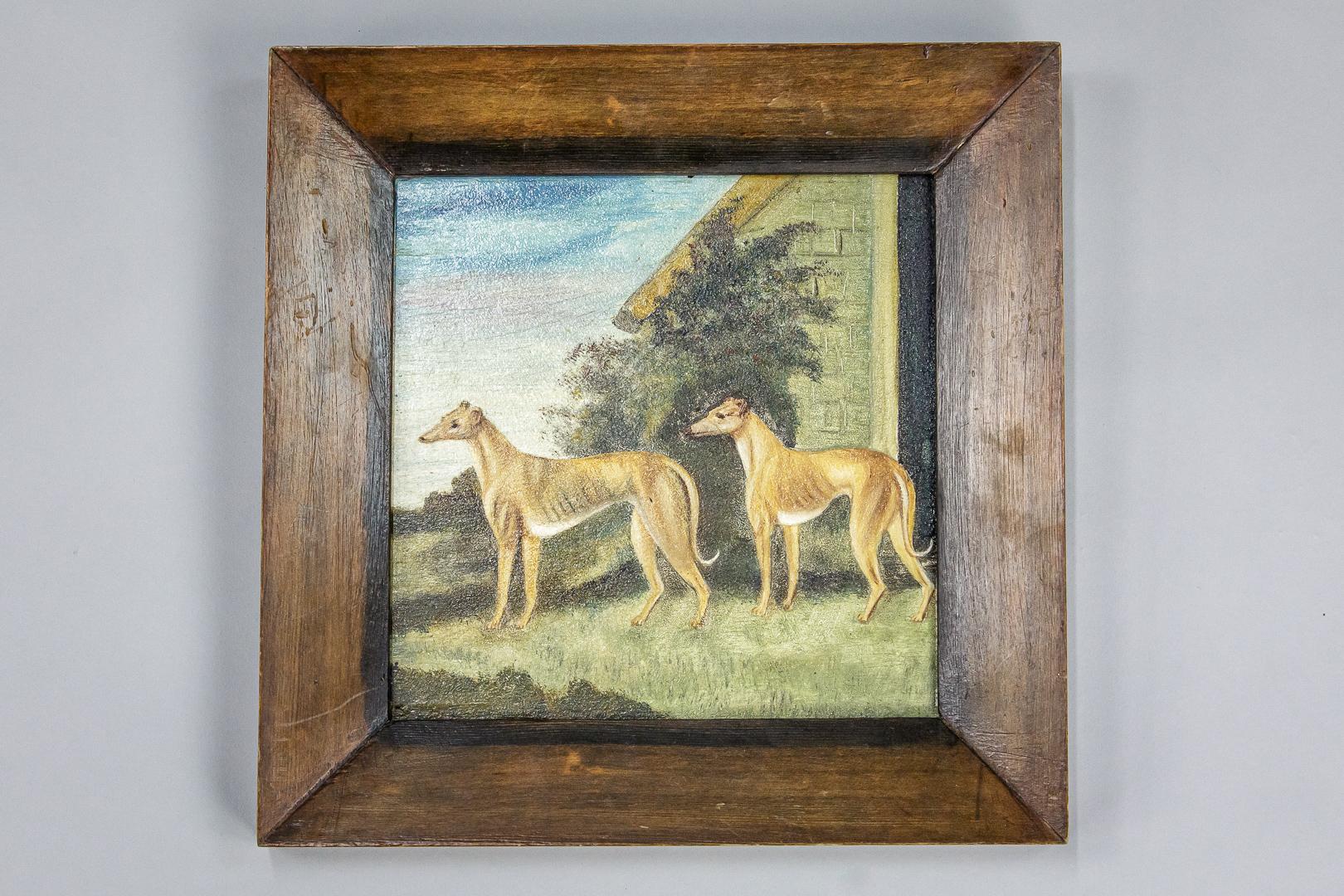 Wonderful pair of naïve oil on panel paintings of greyhounds. Inscribed verso 