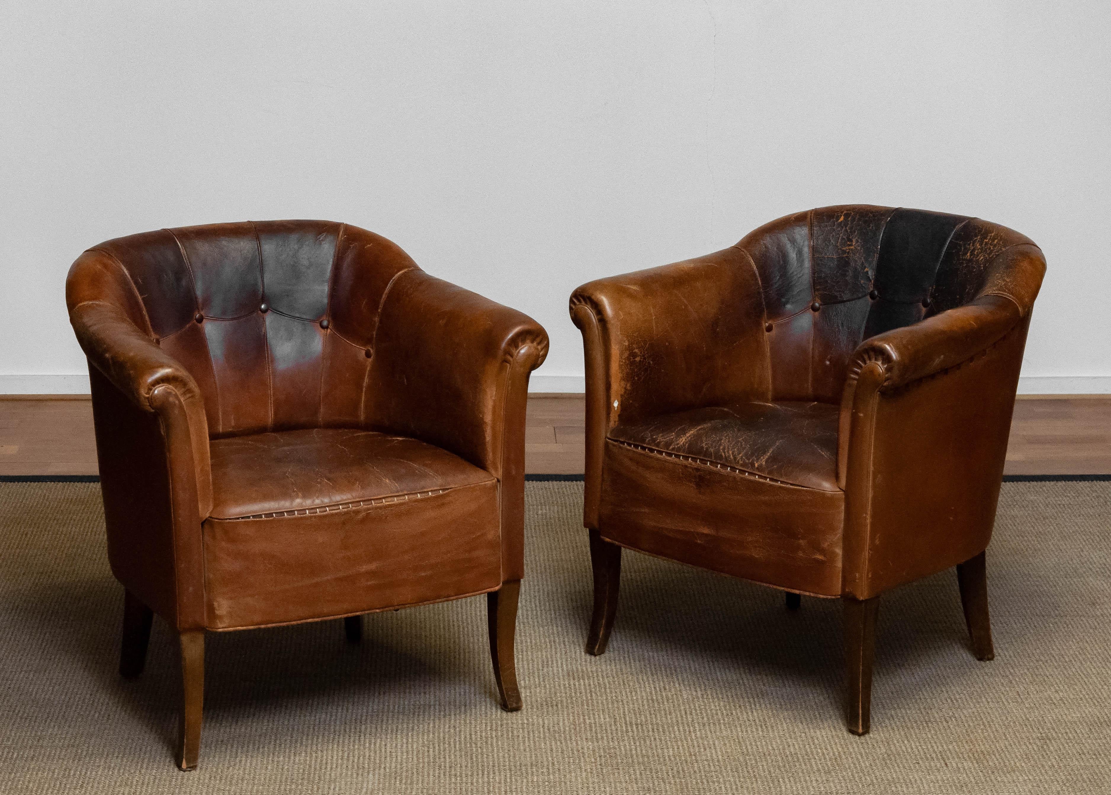 Absolutely unique and stunning pair authentic club / lounge / cigar chairs from the late 19th century made in Sweden.
The great vintage / antique patina gives these chairs their absolutely unique and beautiful character and makes these chairs an