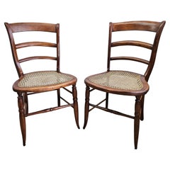 Pair Late 19th Century Victorian Walnut and Cane Seat Ladder Back Side Chairs