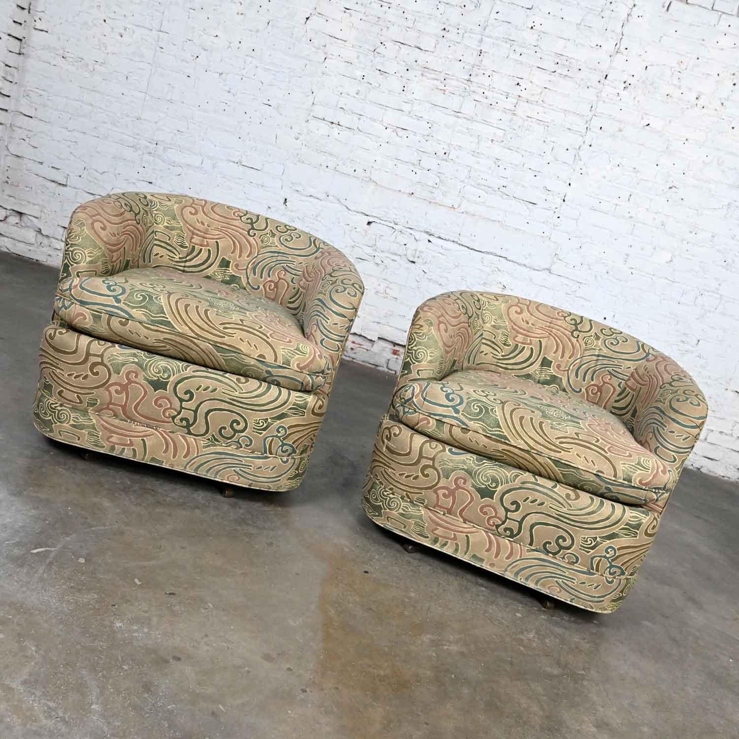 Wonderful vintage modern Drexel Heritage swivel barrel chairs with original contemporary style mauve, green & beige bird fabric, a pair. Beautiful condition, keeping in mind that these are vintage and not new so will have signs of use and wear. This