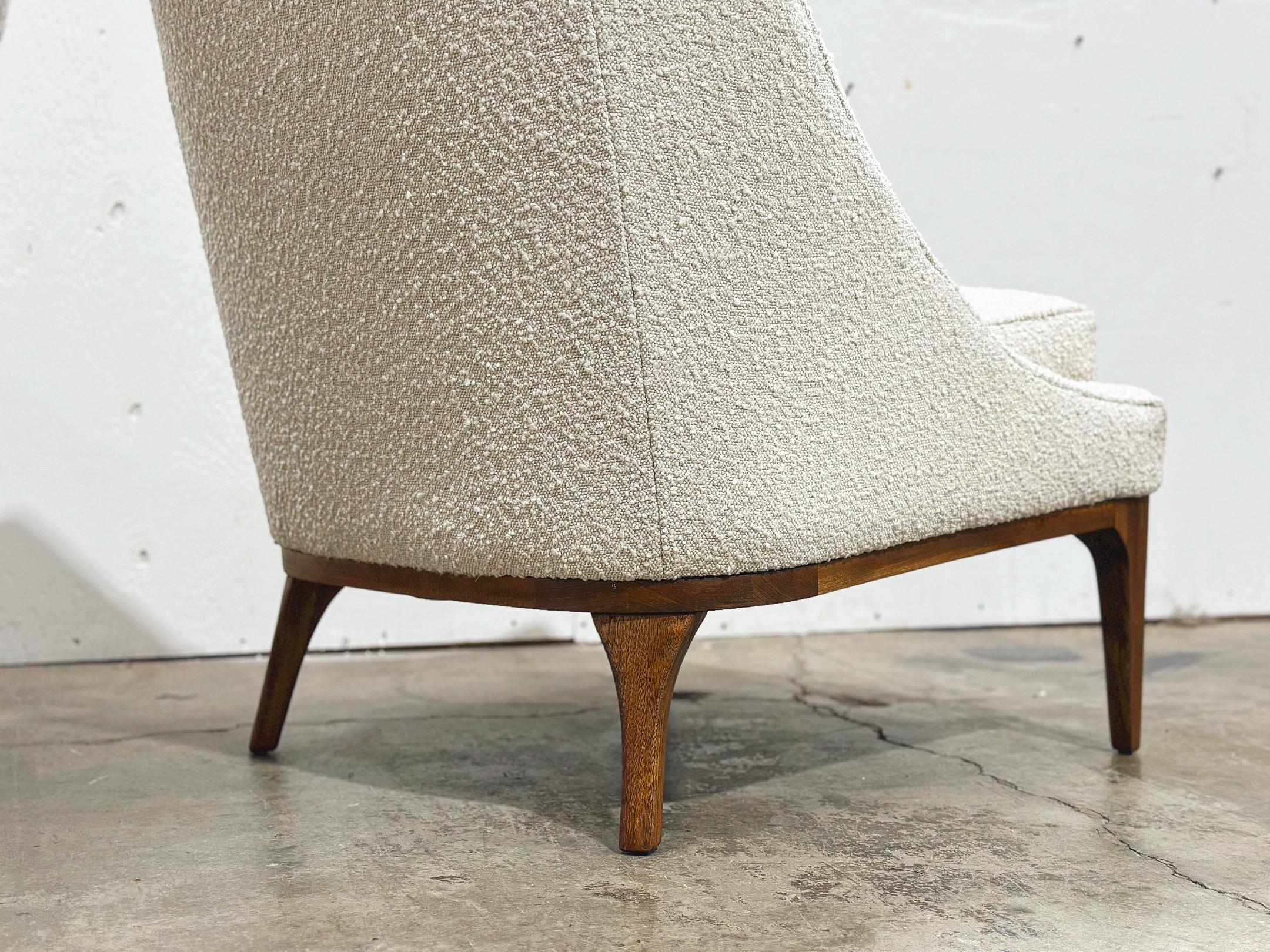 Pair midcentury modern slipper lounge chairs by Lawrence Peabody for Richardson Nemschoff. Meticulously attended to by our team with fully restored solid sculpted walnut bases. All new straps, foam, batting and creamy white performance boucle. These