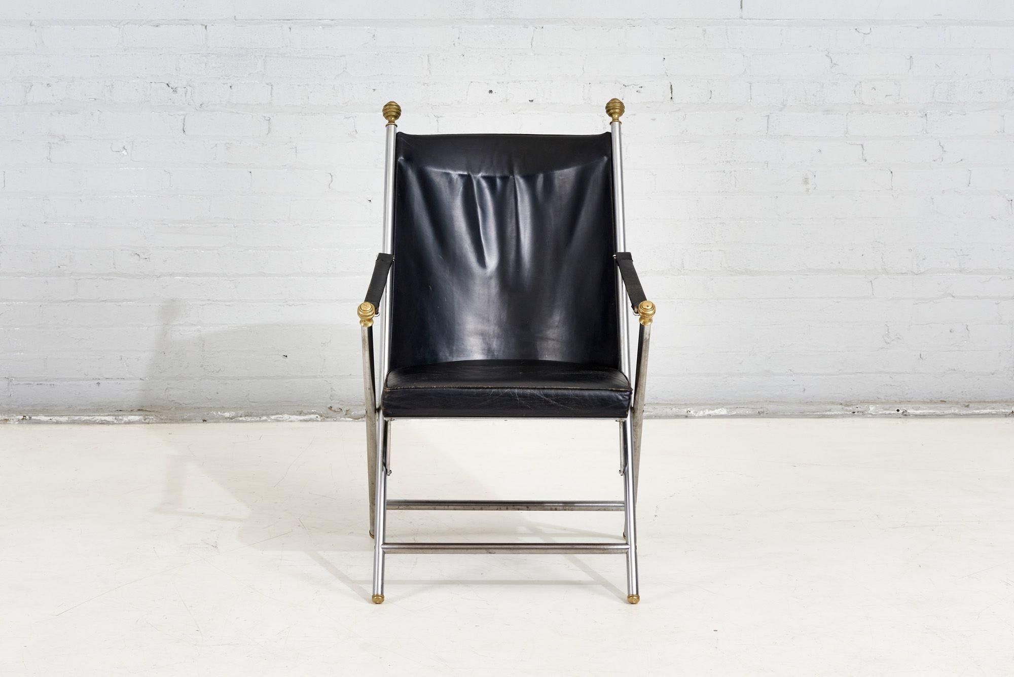 Pair Leather Campaign Folding Chairs by Maison Jansen, 1960.  Original leather.  One chair has a scratch on the leather in the back.

