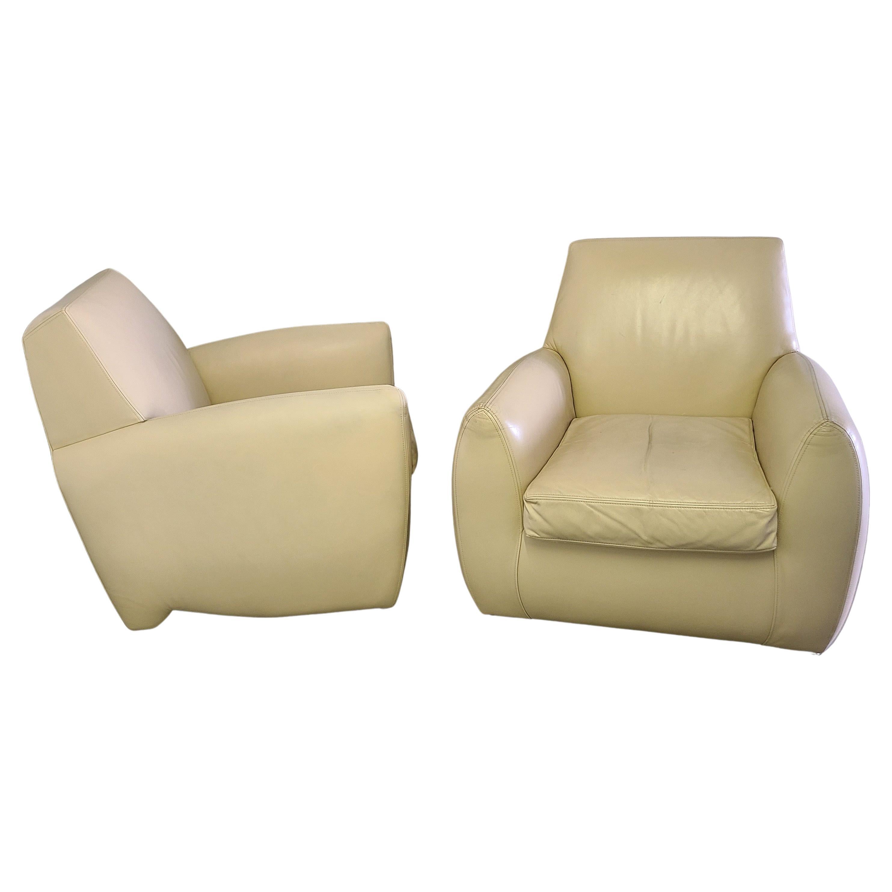 Please message us for a cost effective shipping quote to your location.

Pair leather lounge chairs by Dakota Jackson.