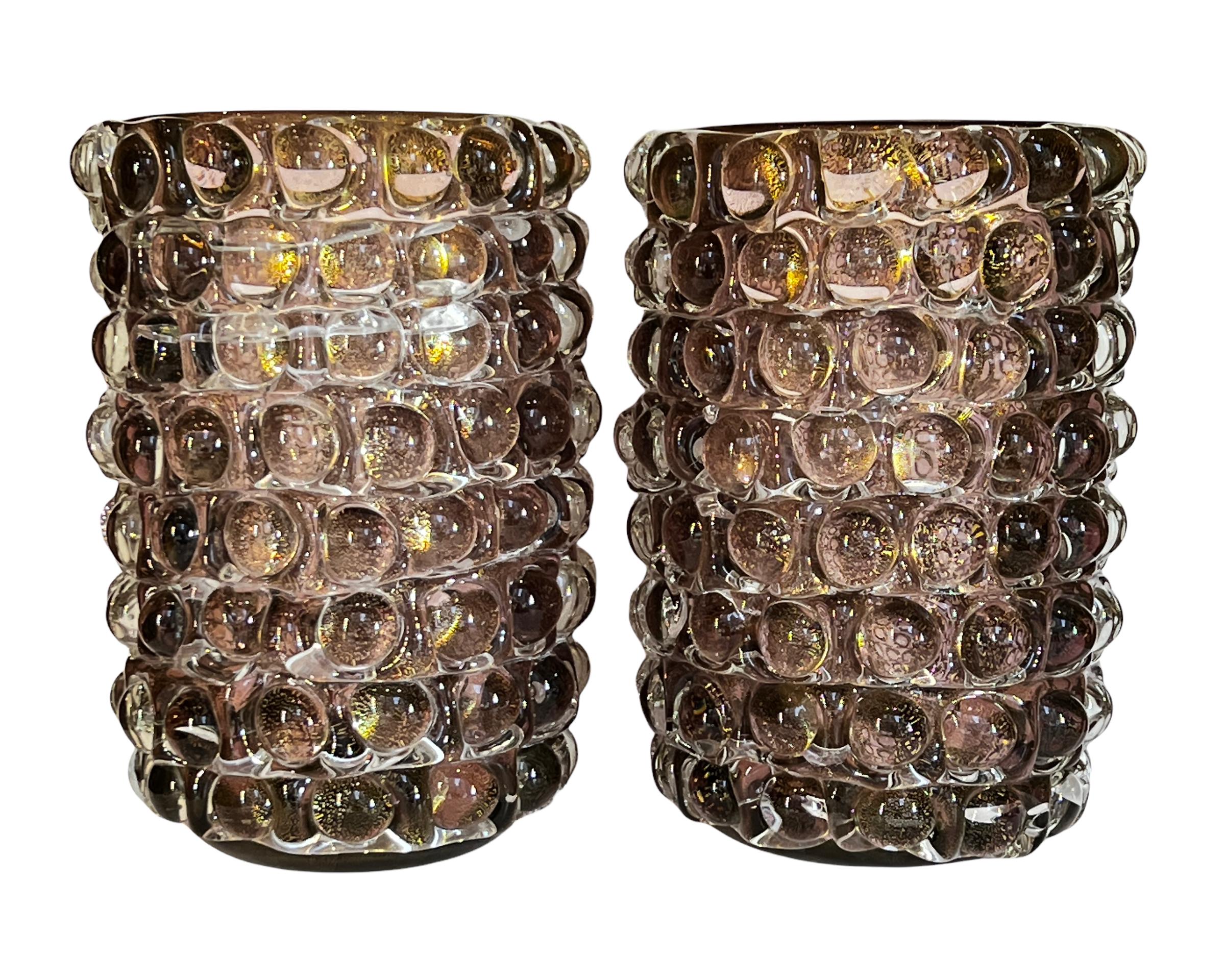 Our beautiful rare pair of Lenti glass vases from Murano, after the innovative series by Ercole Barovier for Barovier, Toso & Co, 1940, are crafted from iridized pale violet glass with spherical applications, or lenti (lenses) as they were described
