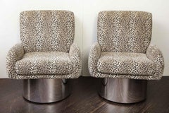 Pair of Leon Rosen Swivel Chairs