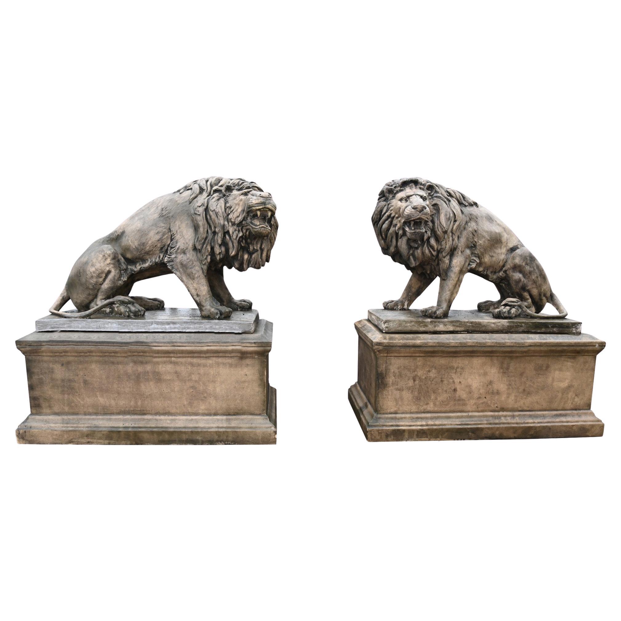 Pareja de estatuas de portero león a tamaño natural Casa de campo de piedra