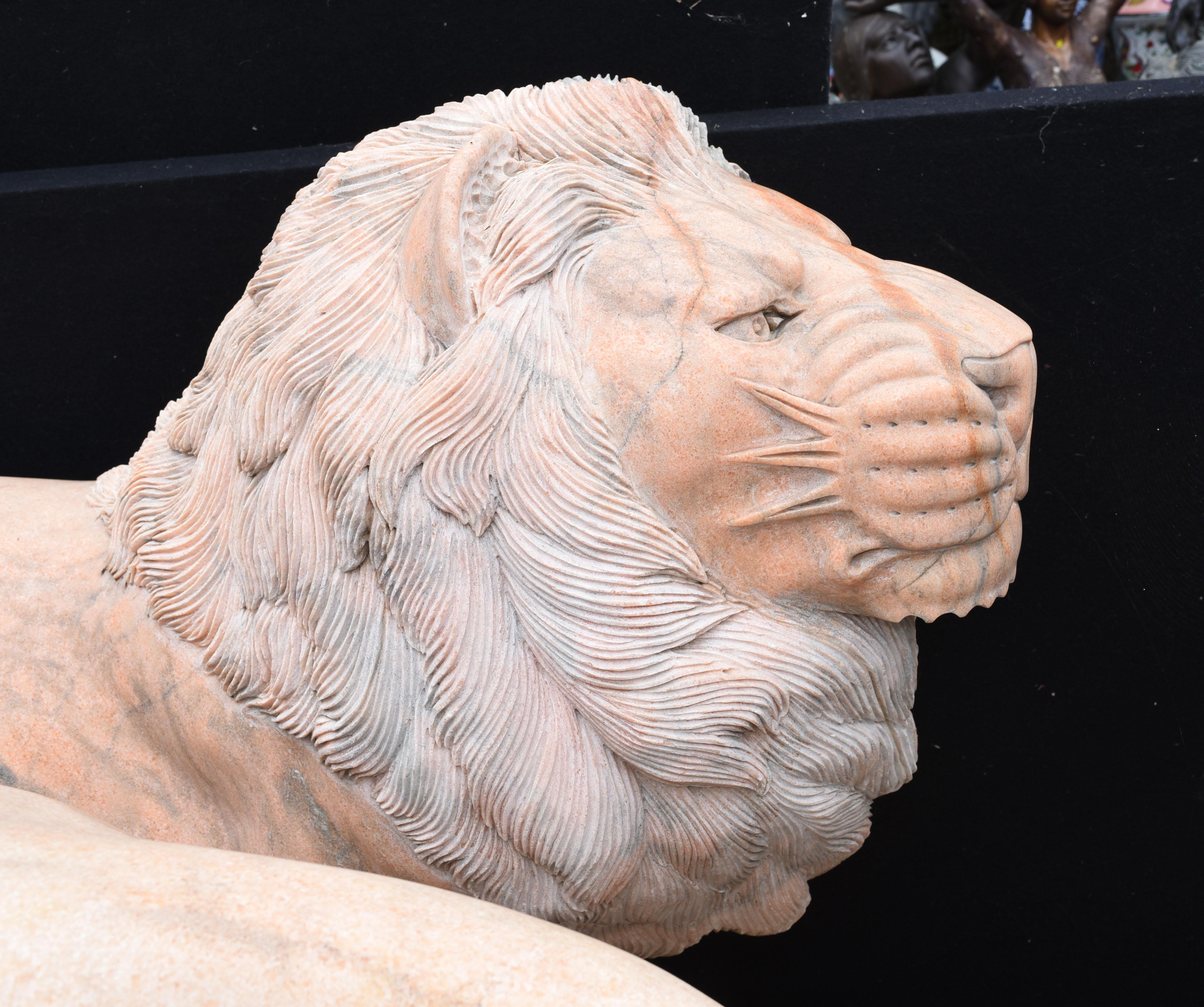 giant wooden lion sculpture