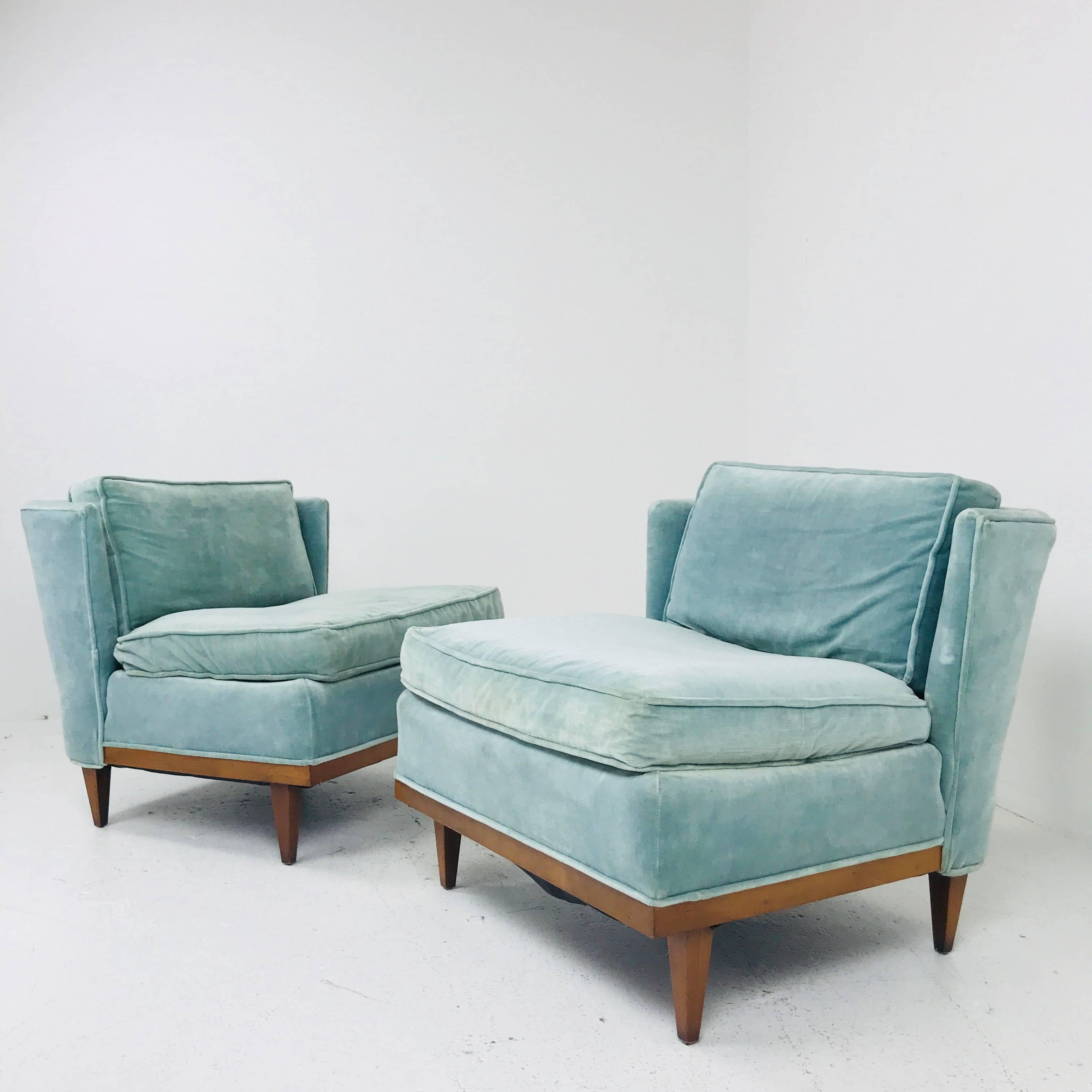 Pair of light blue mid-century velvet slipper wingback chairs. Chairs are in good vintage condition and need new upholstery and refinishing.

Dimensions: 30
