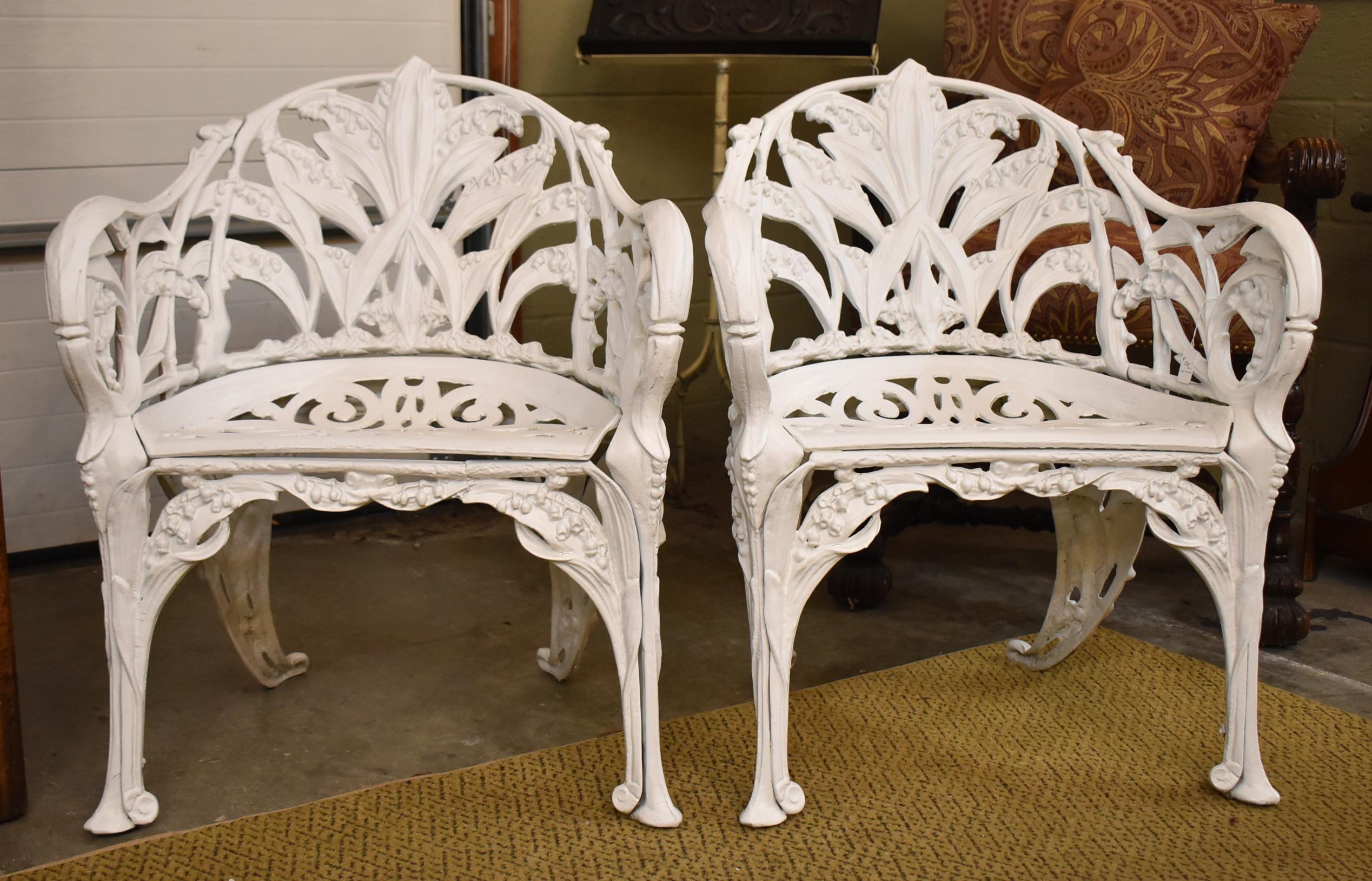 Pair iron Lily of the Valley white garden chairs. Very nice condition. Not sure if finish is original. Dimensions: 22