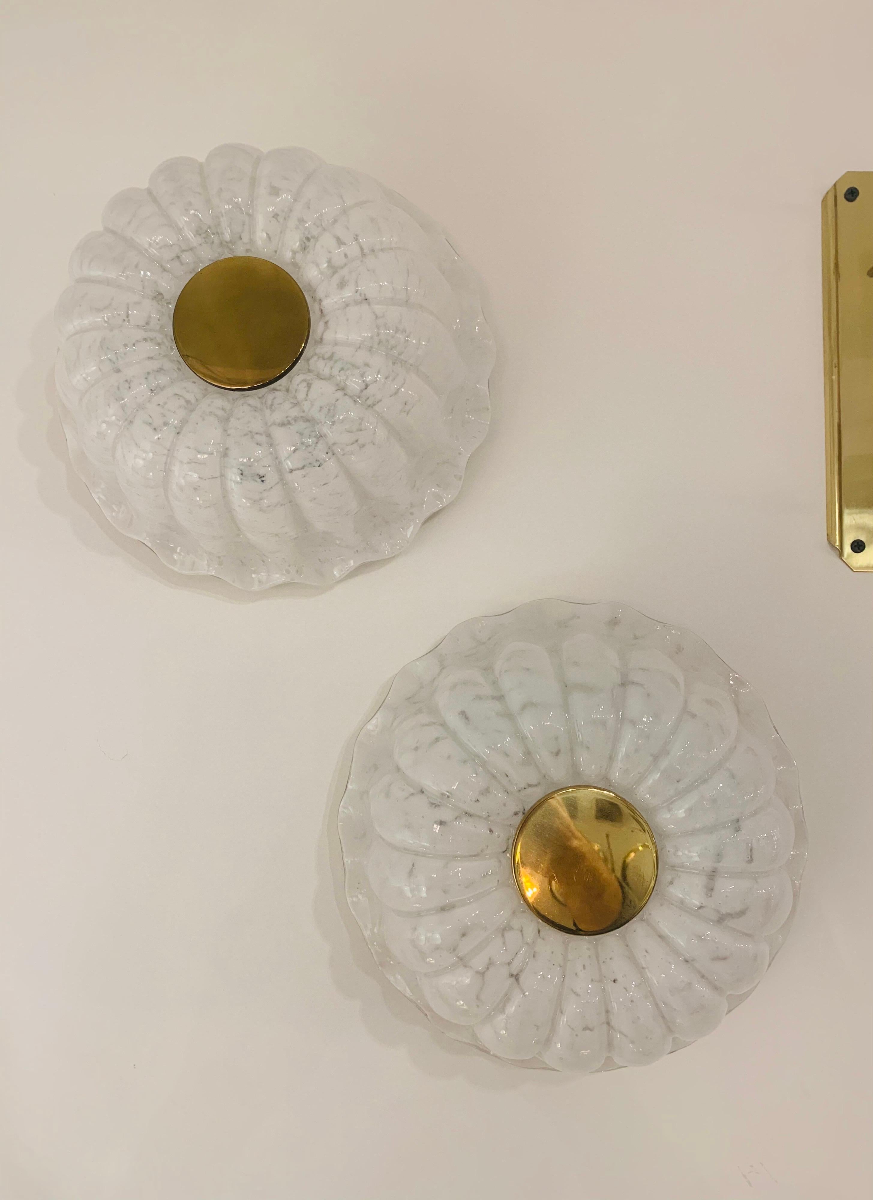 A wonderful pair of cloud white floral glass and polished brass ceiling lights by Limburg. New rewired.