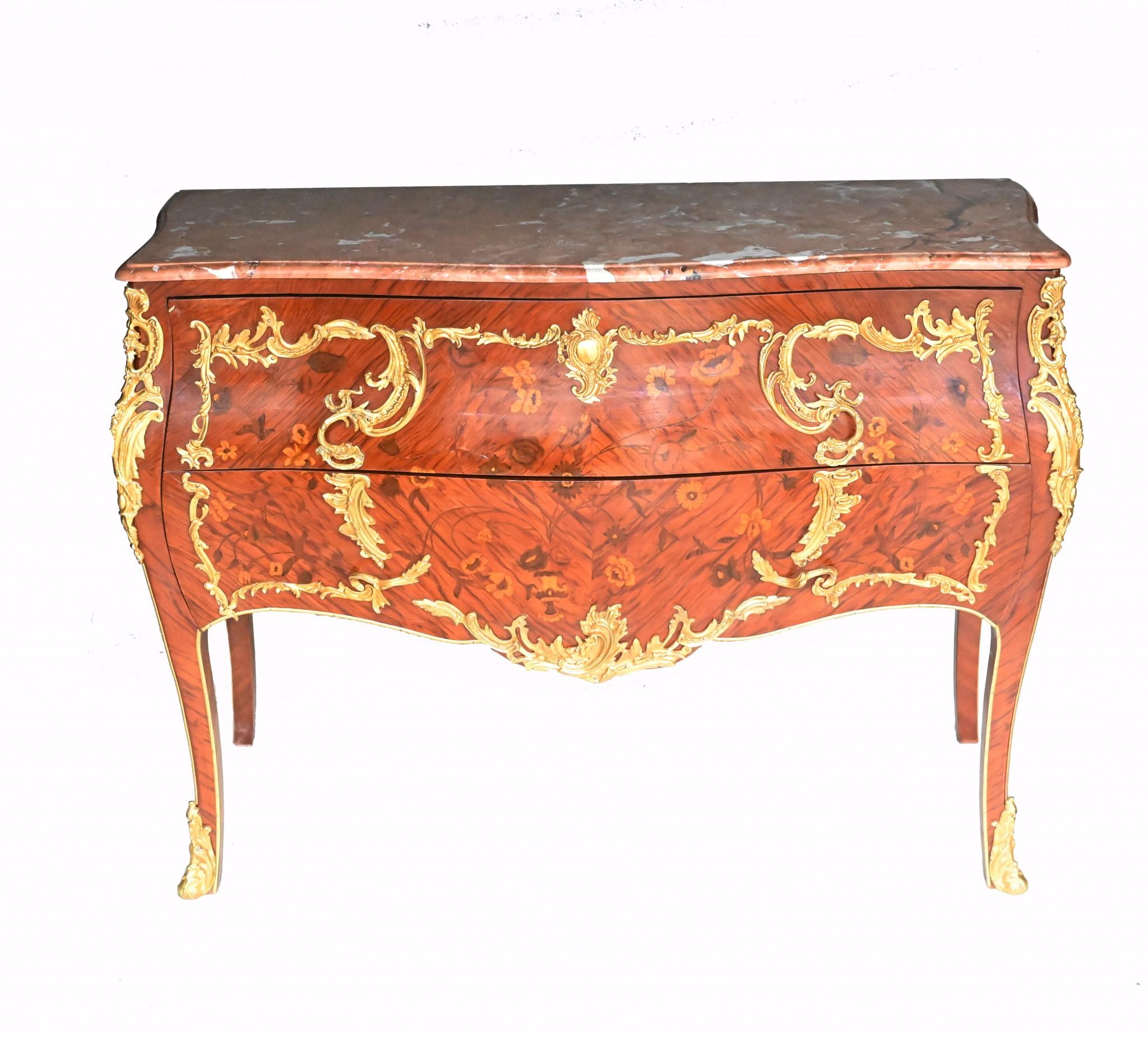 Absolutely stunning pair of French commodes after Francois Linke
Such a great design with the bombe form and intricate inlay work
Features a shaped red marble top which is smooth and chip free
I love the rococo form to the original gilt fixtures