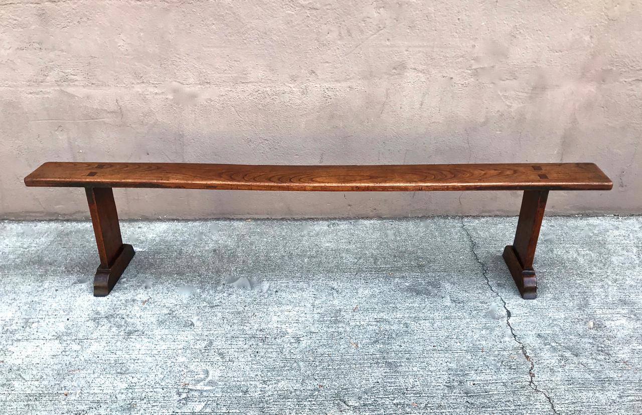This is a superb pair of 19th century English or French chestnut trestle benches. The benches are in very good overall condition, retaining their original patinated surface. European chestnut is an uncommon, aesthetically beautiful wood, similar to